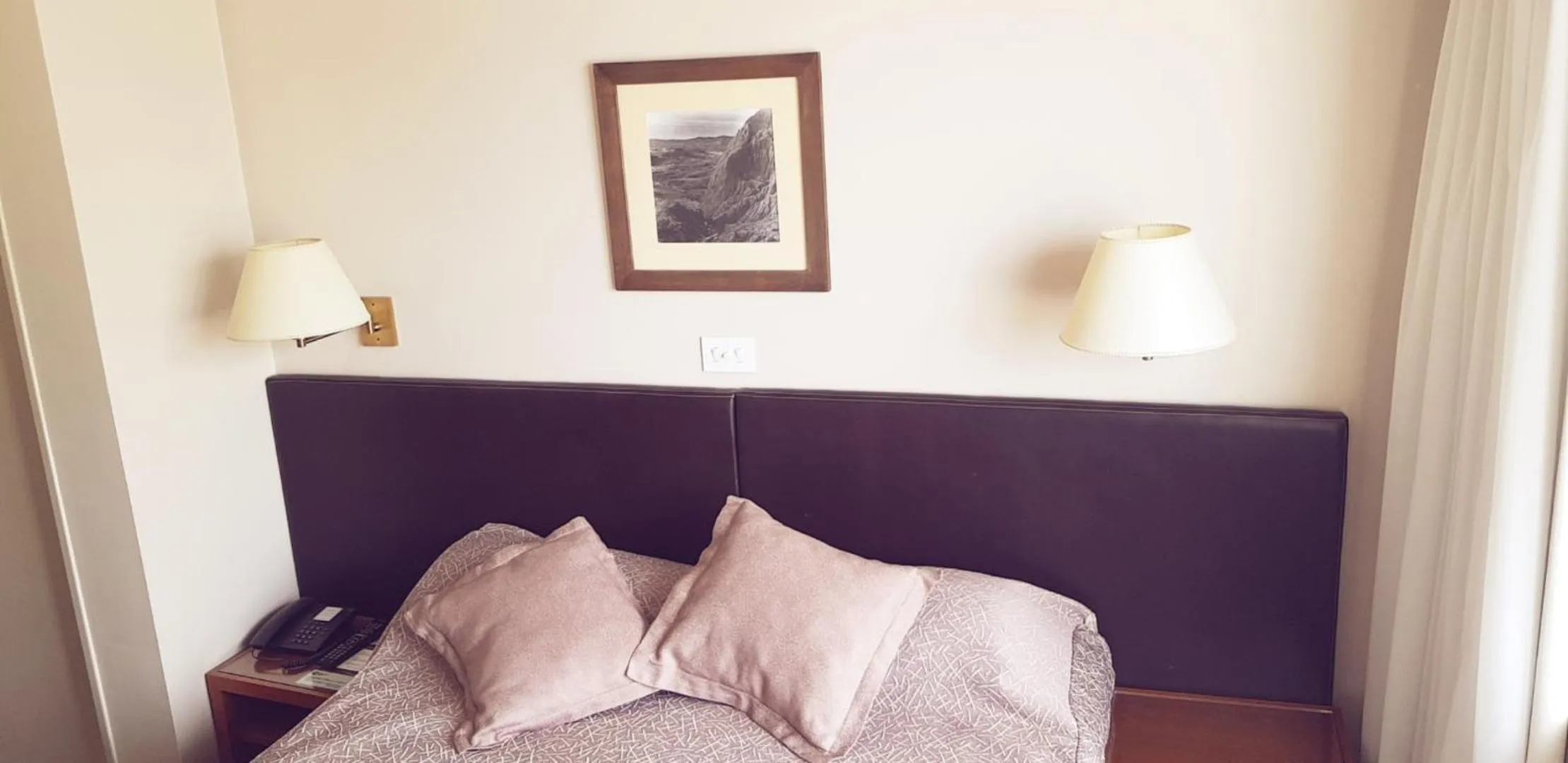 Bed in Comodoro Hotel