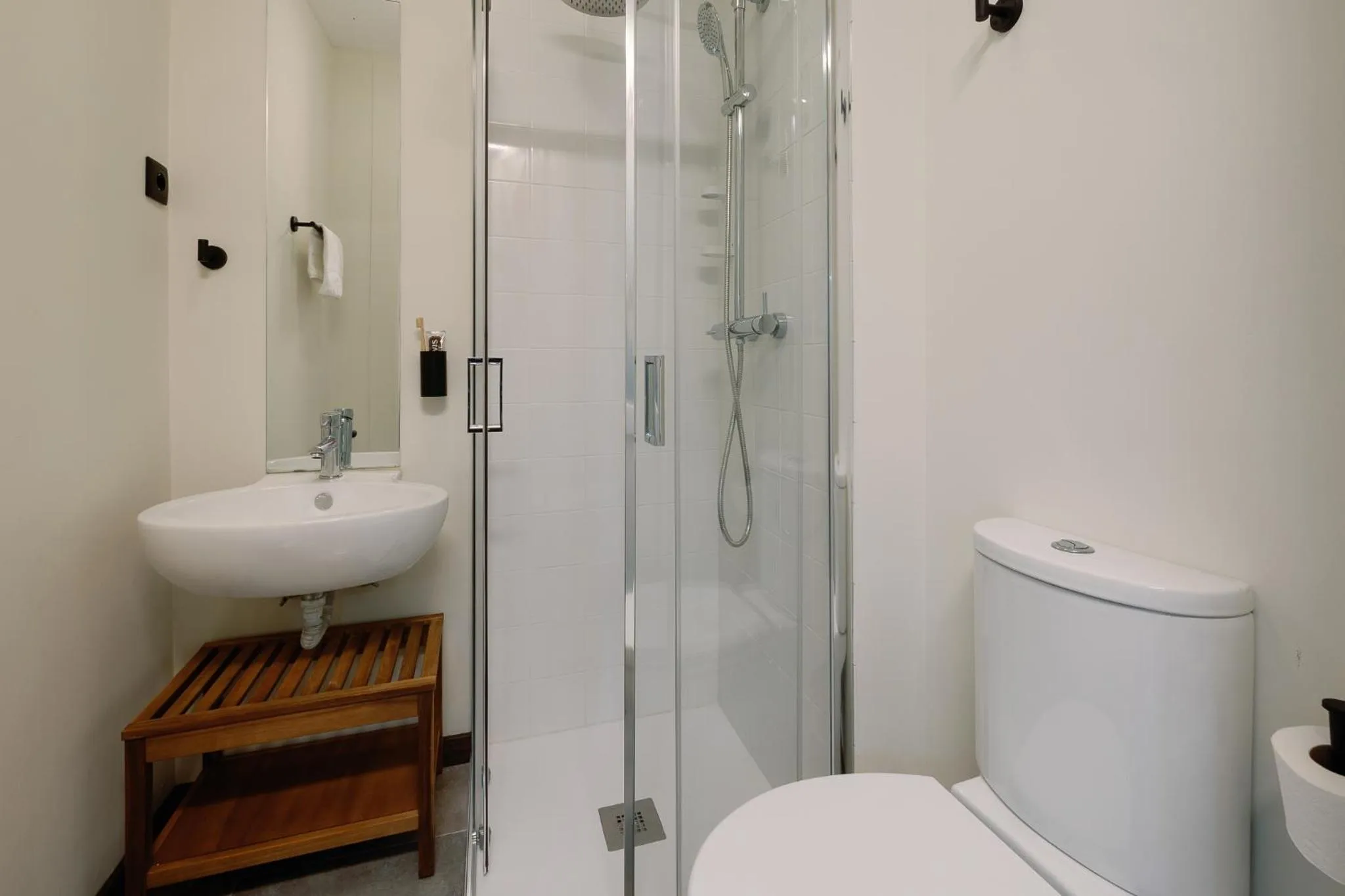 Bathroom in Cosme Apartments by Olala Homes