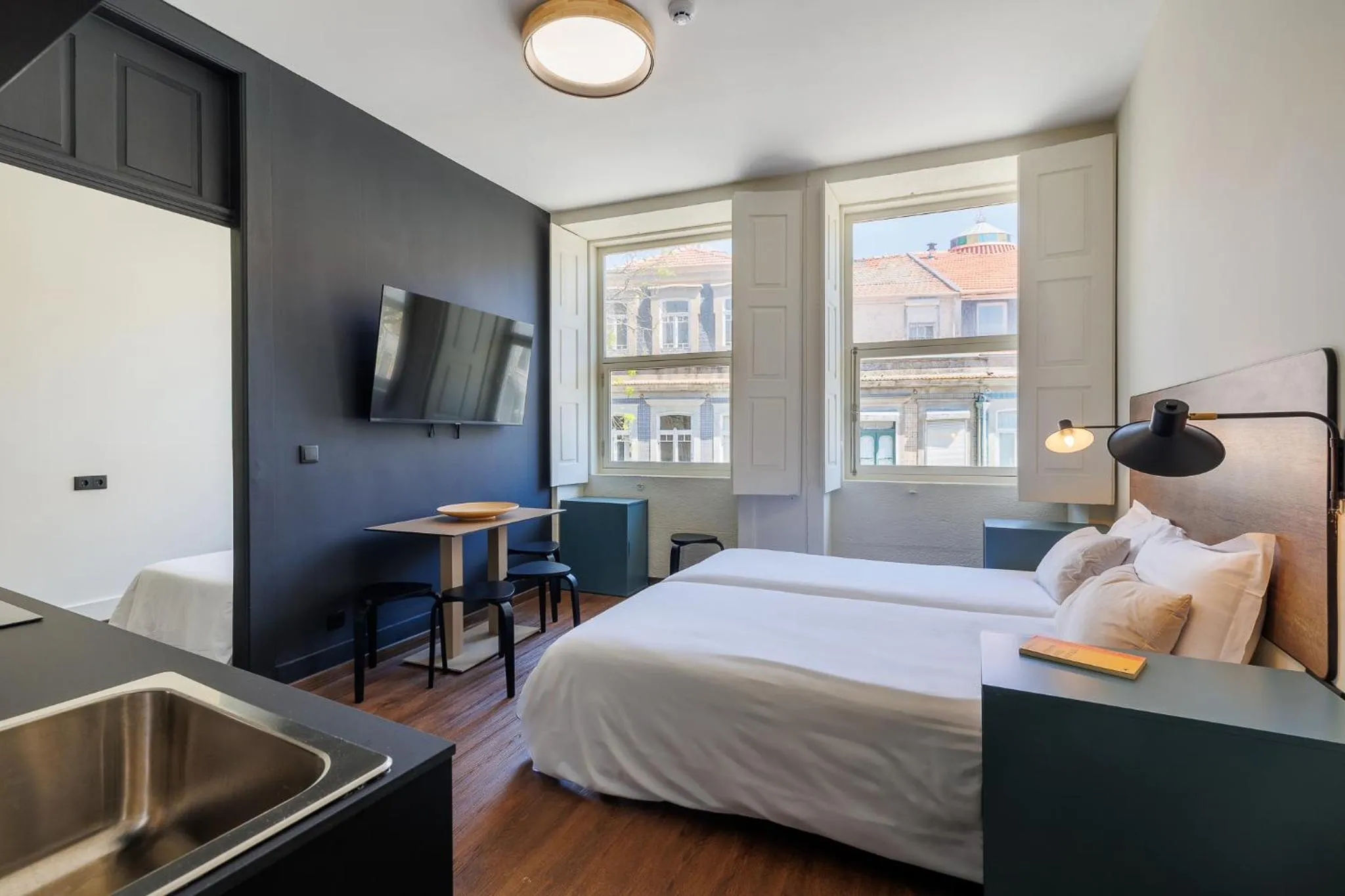 Bedroom, Bed in Cosme Apartments by Olala Homes