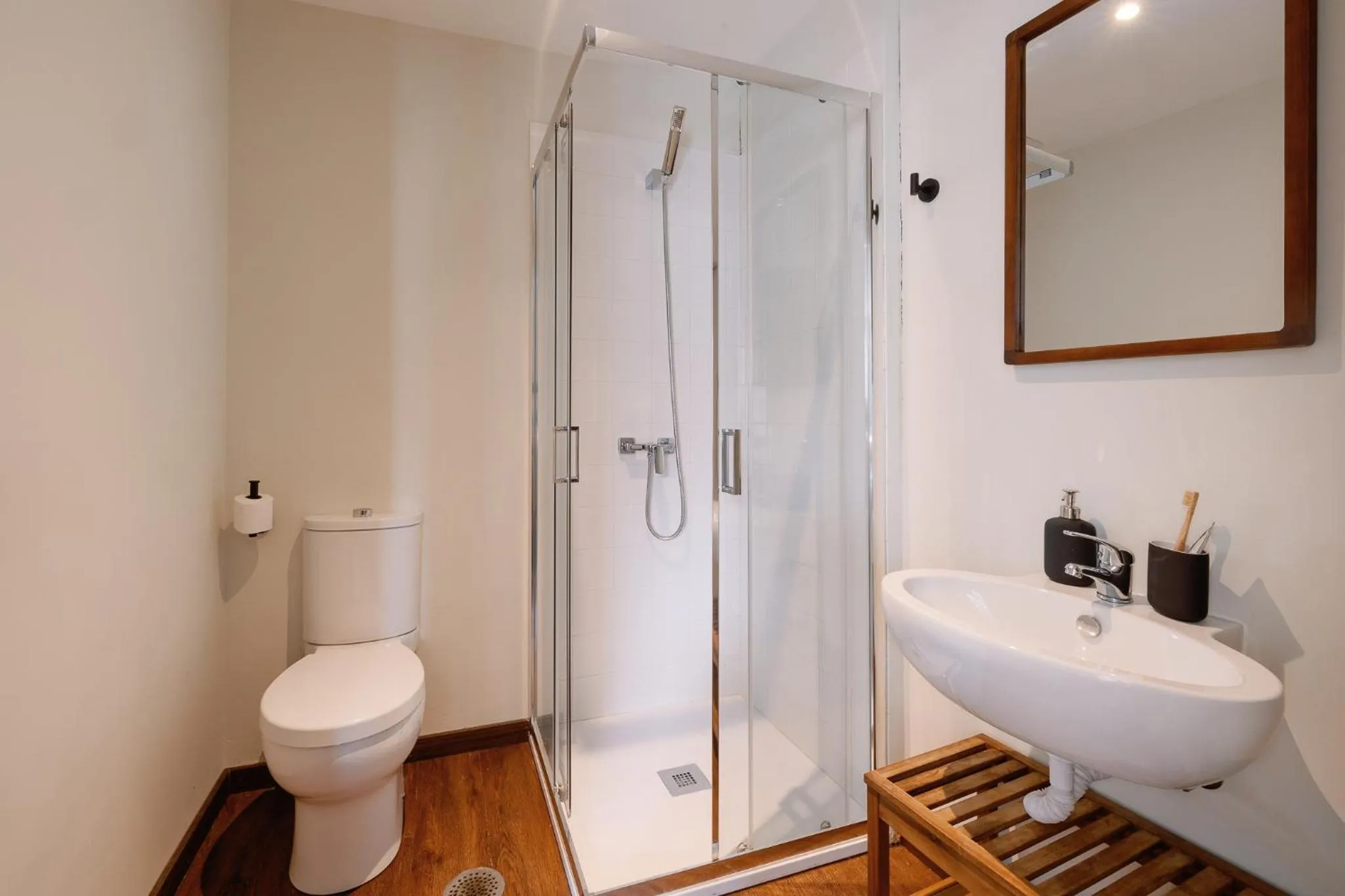 Bathroom in Cosme Apartments by Olala Homes