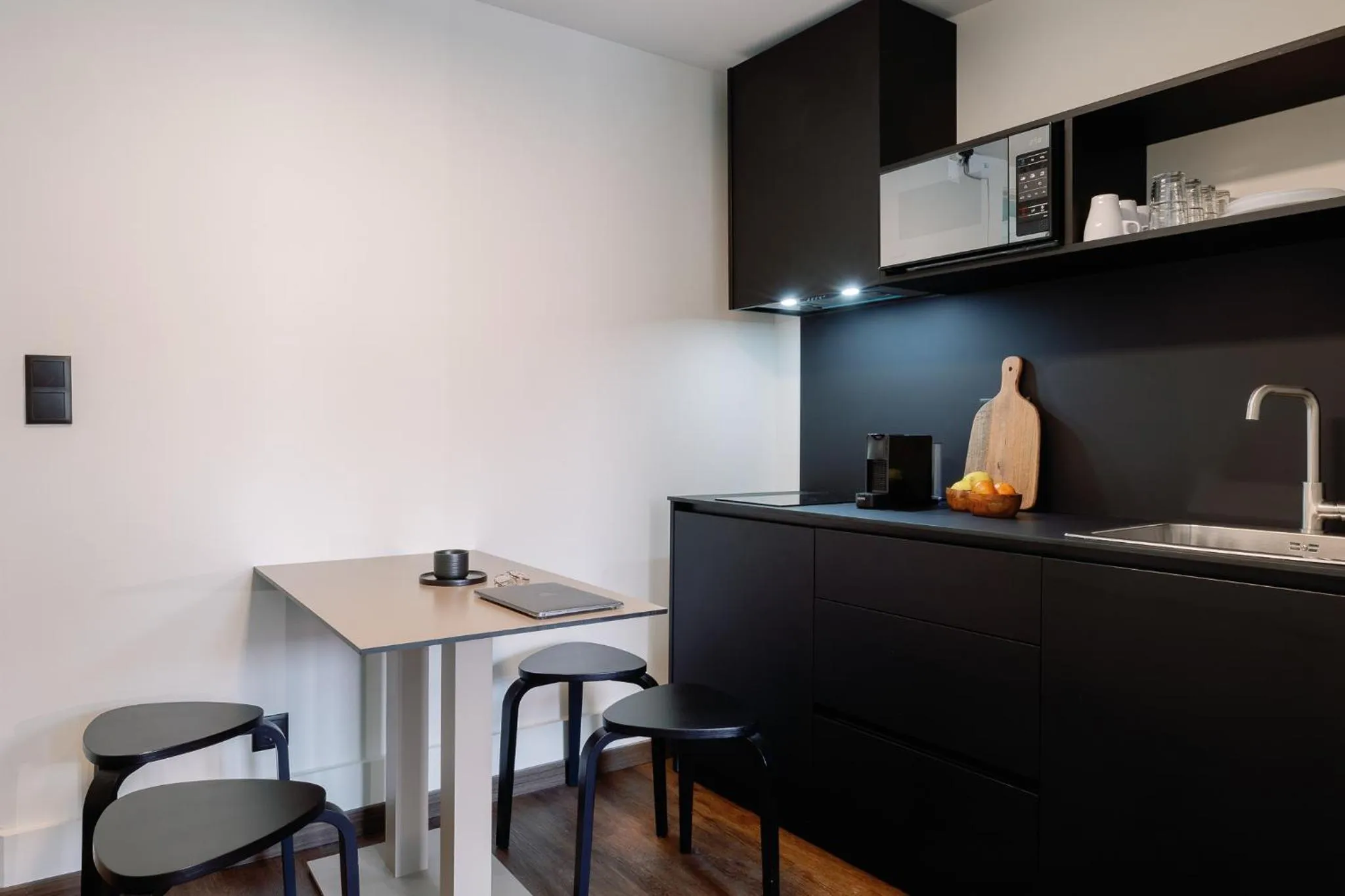 kitchen in Cosme Apartments by Olala Homes