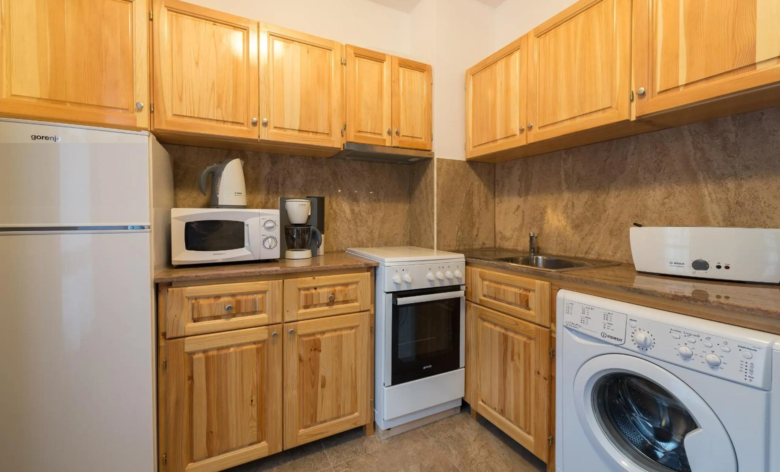 Kitchen or kitchenette in Grand Vitosha Apartments