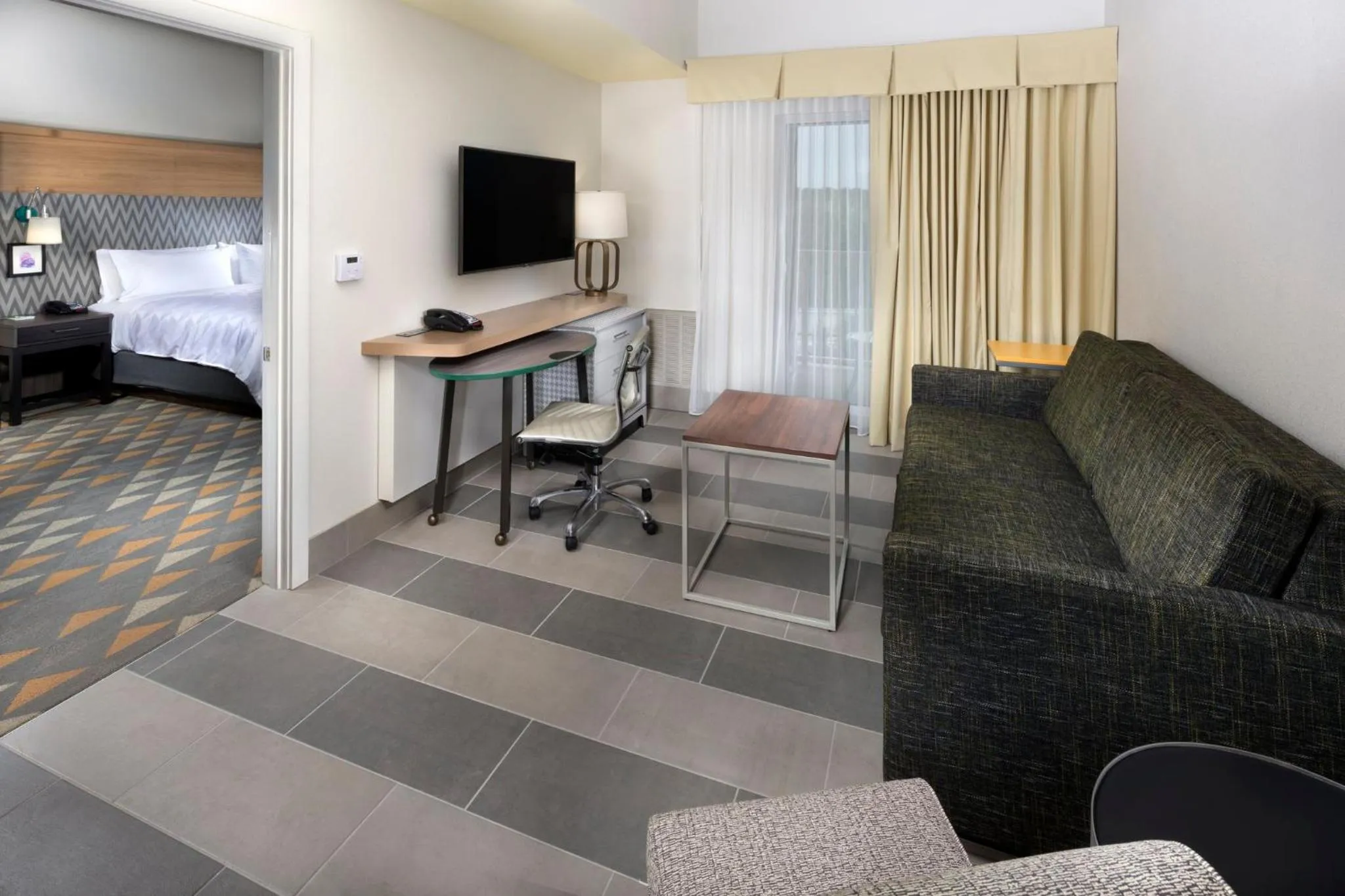 Bedroom in Holiday Inn & Suites Arden - Asheville Airport by IHG