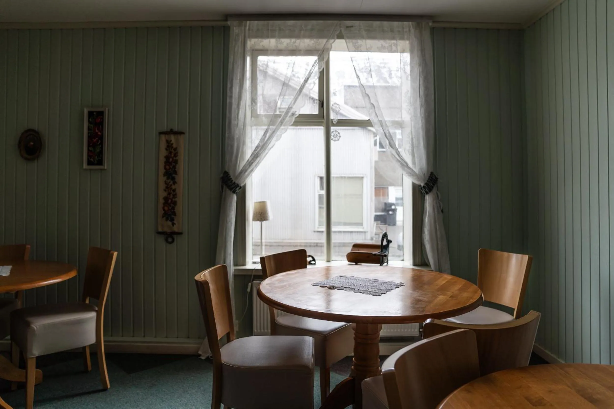 Communal lounge/ TV room in Guesthouse Gamla