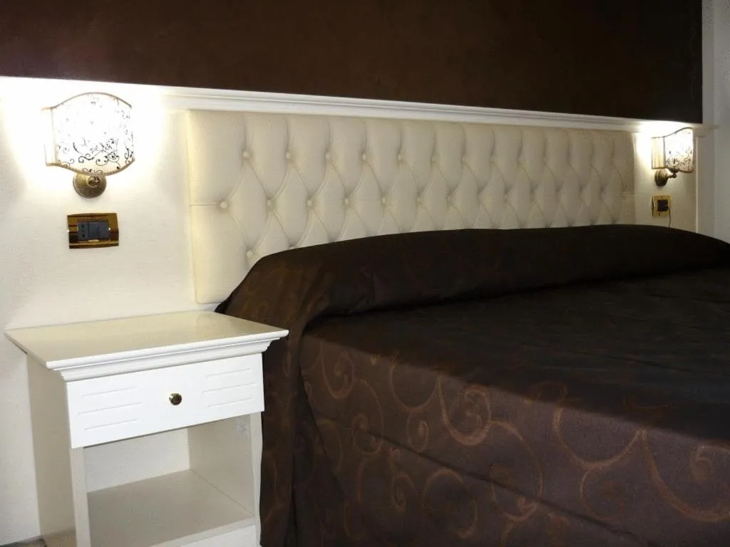 Decorative detail, Bed in Hotel Madonna Delle Grazie