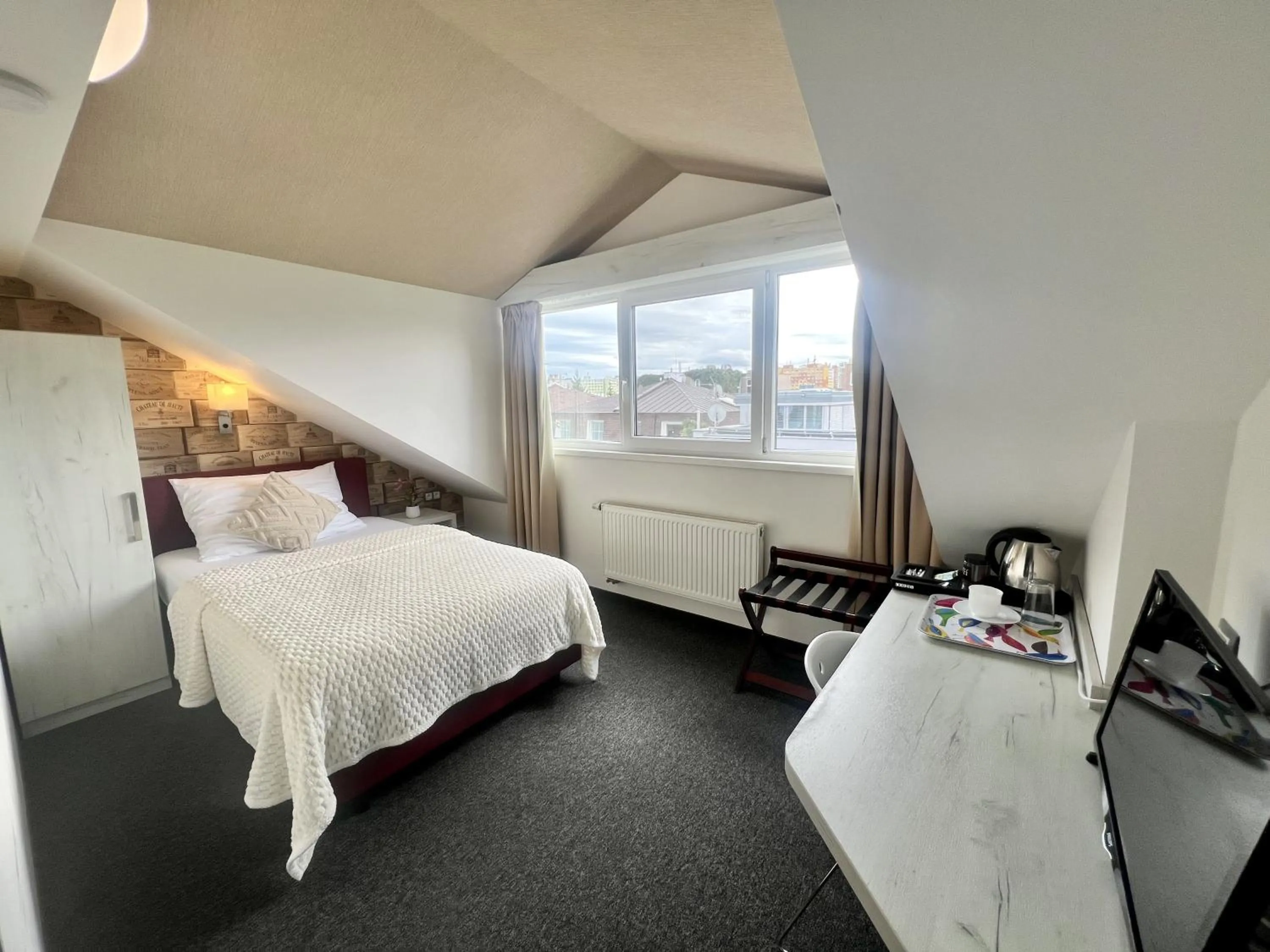 Bed in Grand Petit Hotel ex Shato Gesson