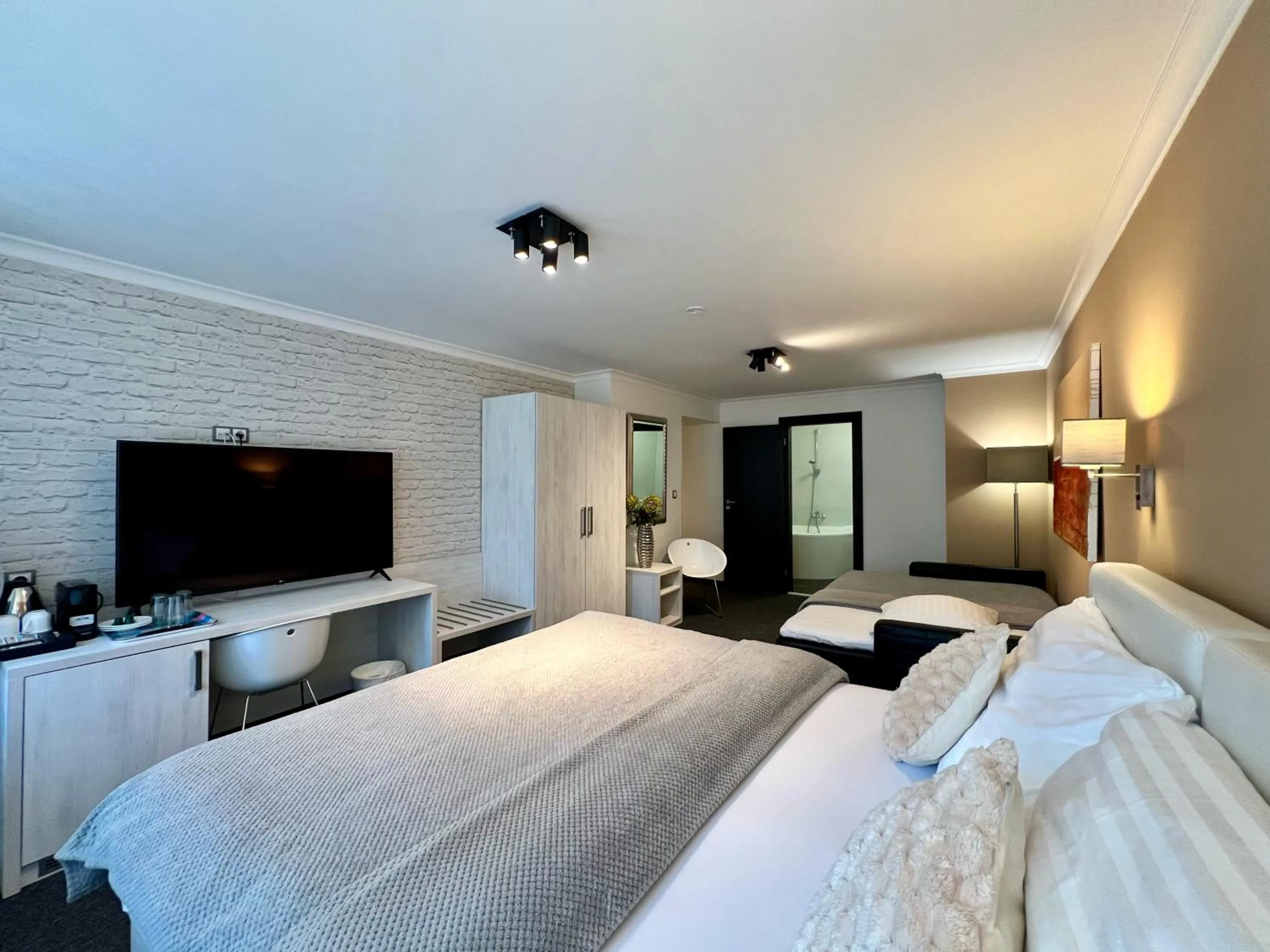 Bed in Grand Petit Hotel ex Shato Gesson