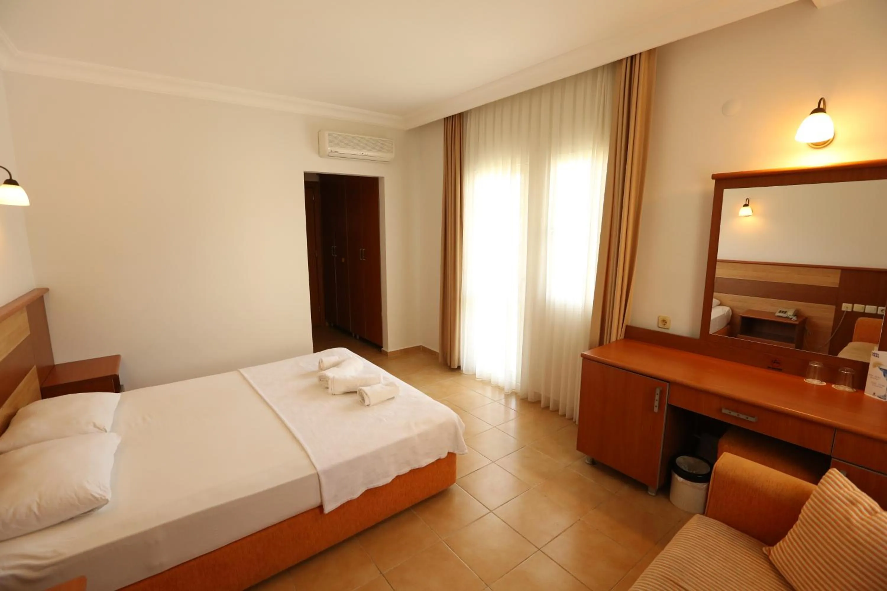 Bed in Mavruka Hotel