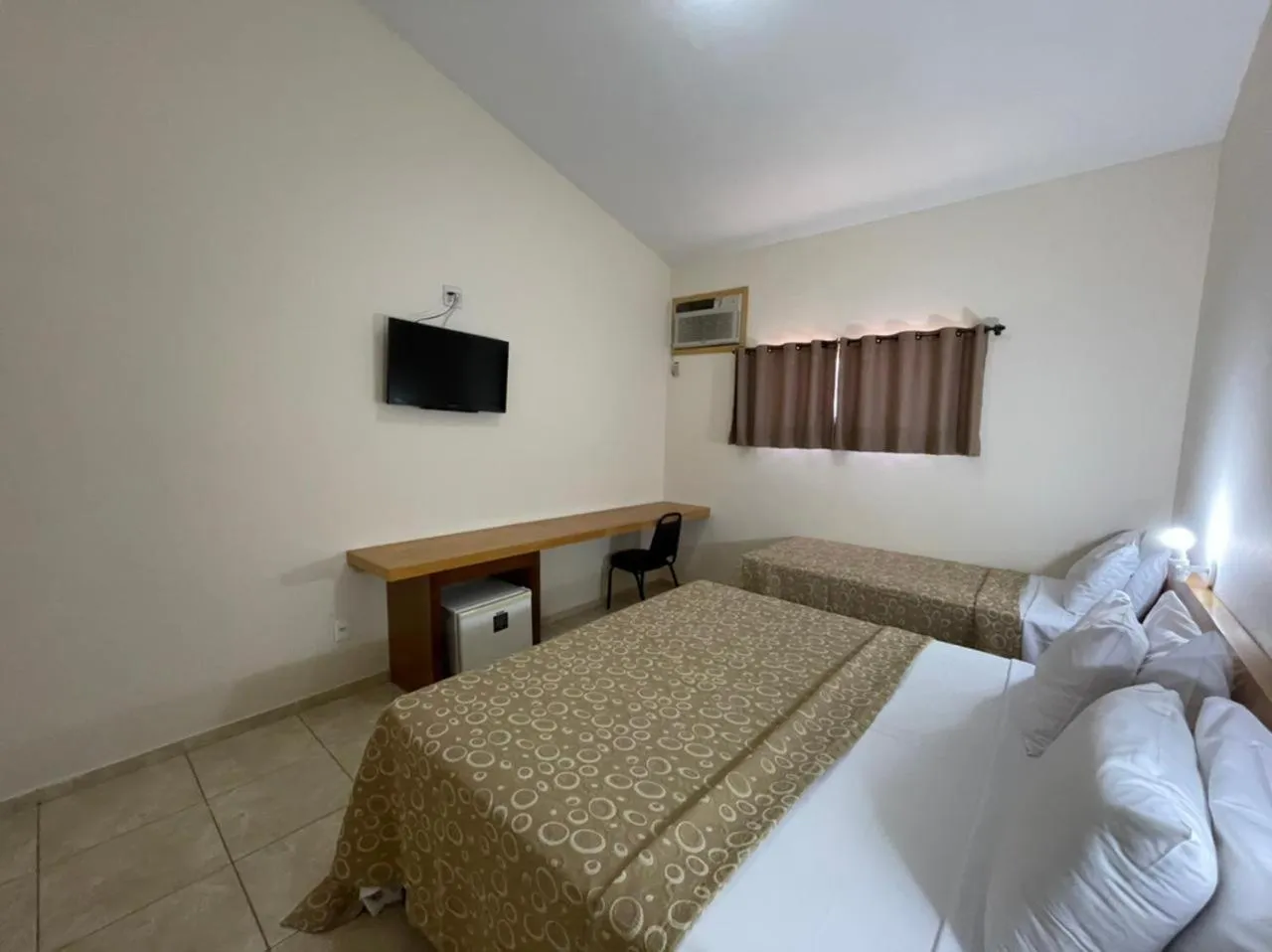 Bed in IPÊ PARK Convention Hotel