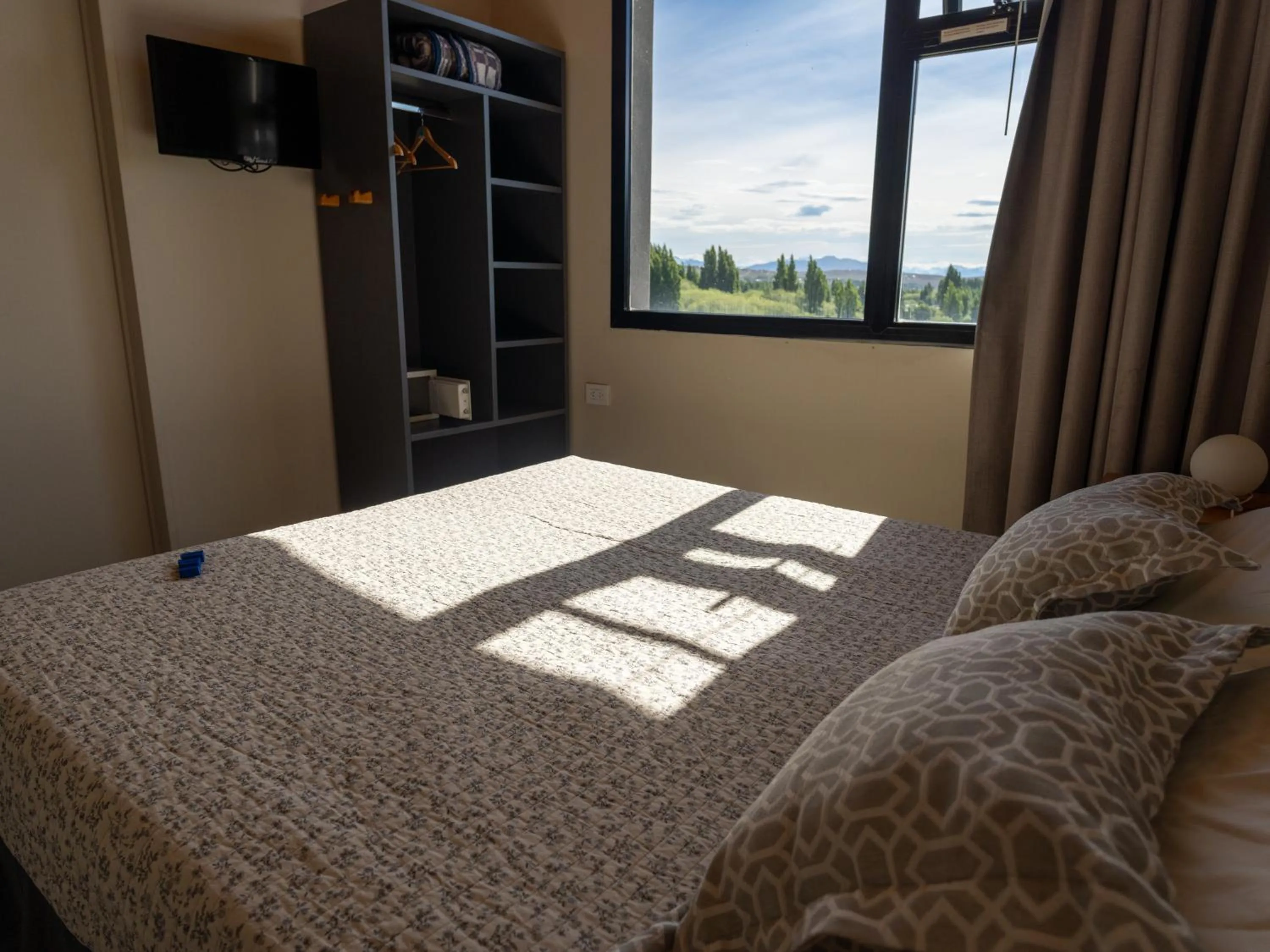 Garden view, Bed in America Del Sur Calafate Hostel