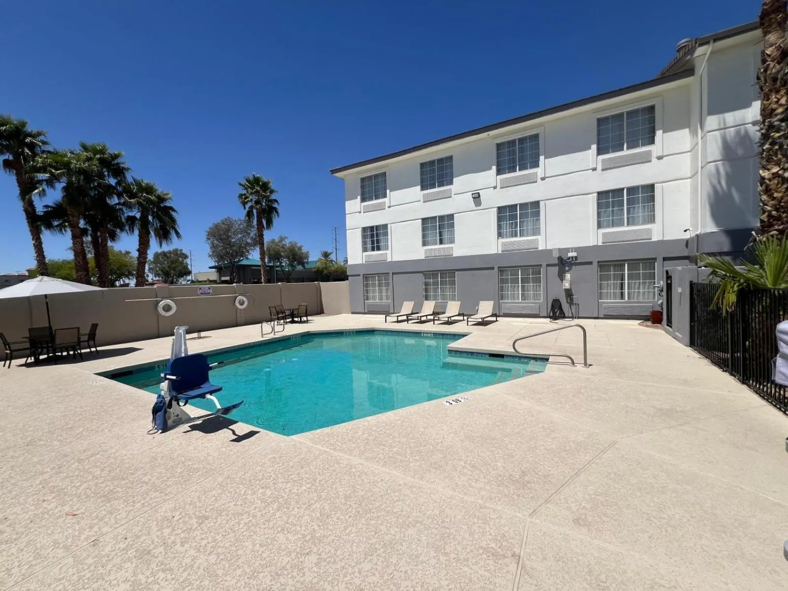 Swimming pool in Days Inn & Suites by Wyndham Surprise