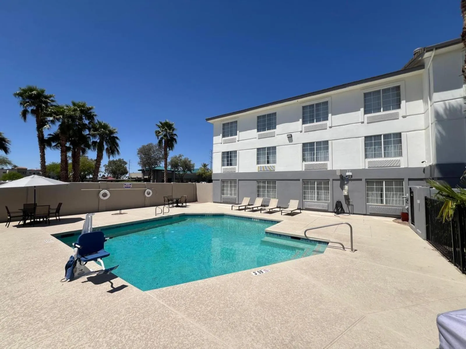 Swimming pool in Days Inn & Suites by Wyndham Surprise