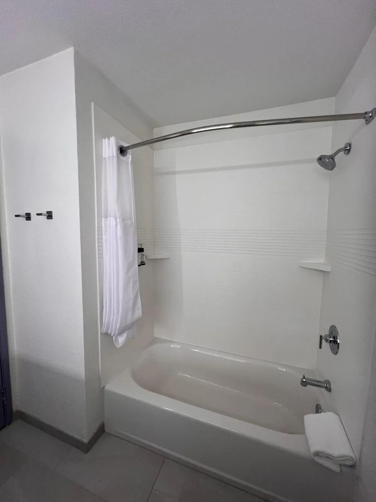 Bathroom in Days Inn & Suites by Wyndham Surprise