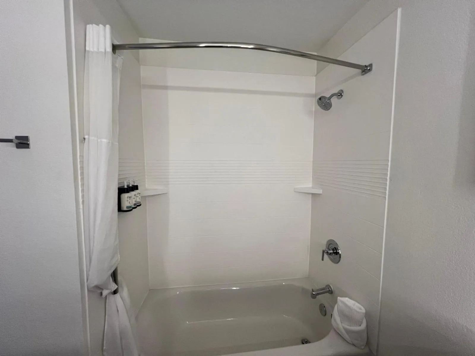 Bathroom in Days Inn & Suites by Wyndham Surprise