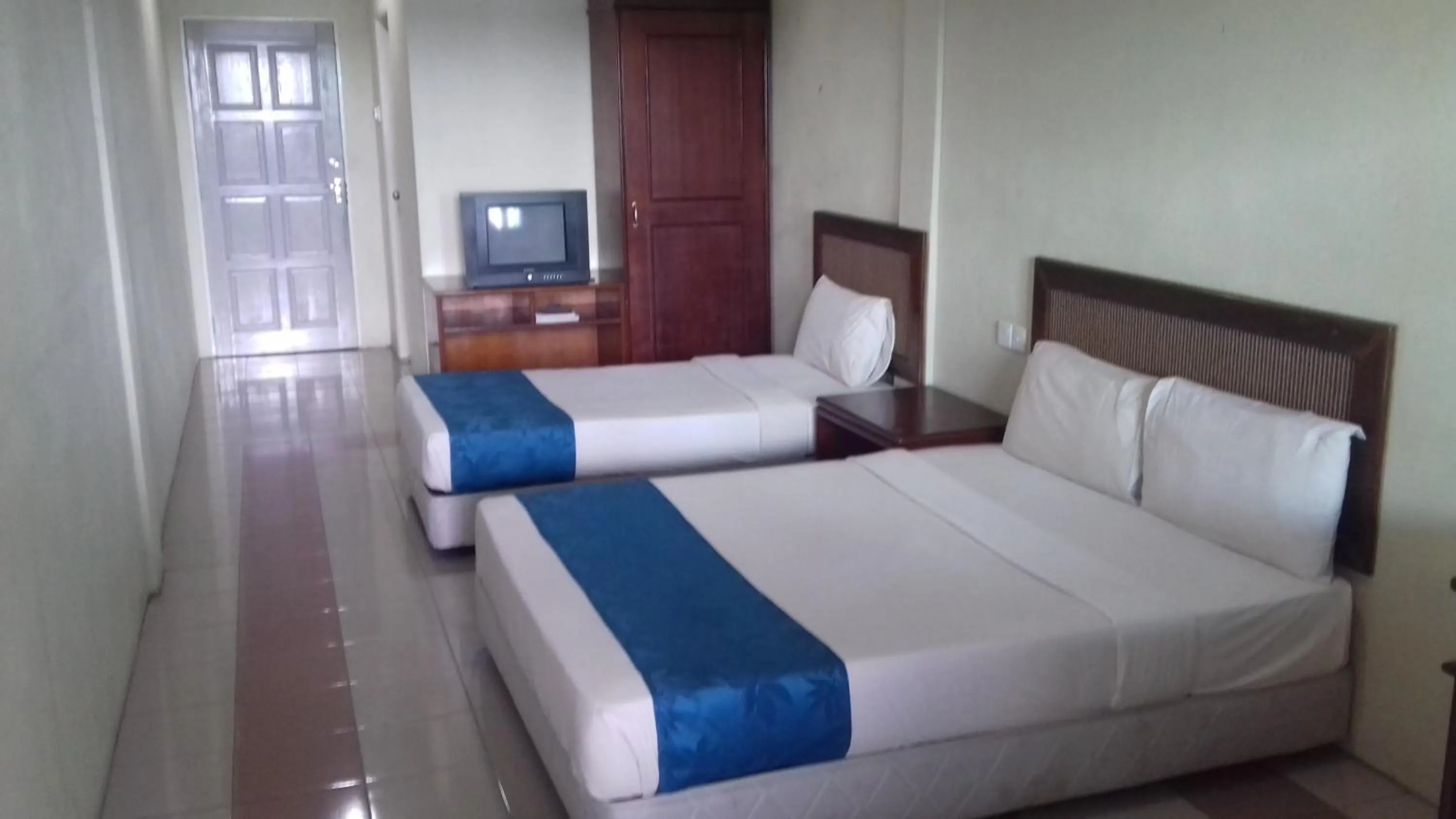 Bed in Arwana Inn Tok Bali