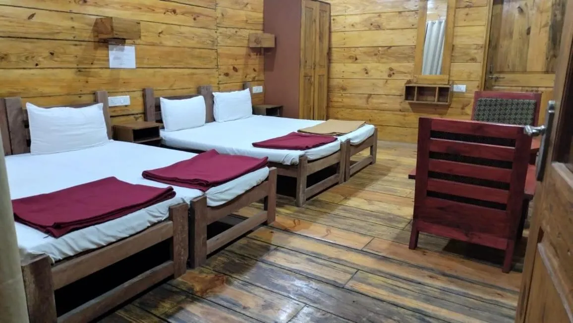 Bed in Brushwood Villa- Cottages and Bar