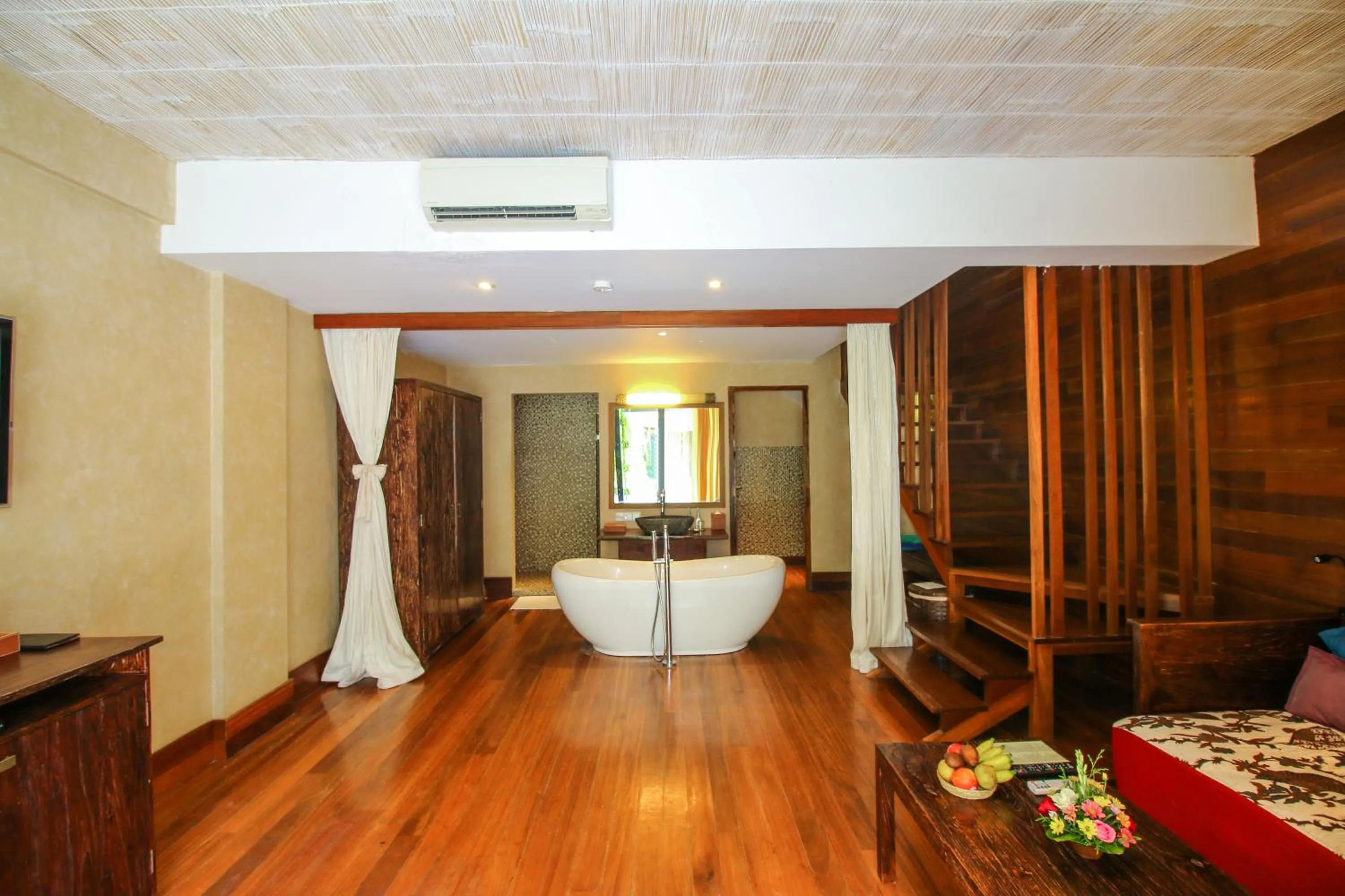 Living room, Bed in Kupu Kupu Jimbaran Beach Hotel & Spa by L’Occitane
