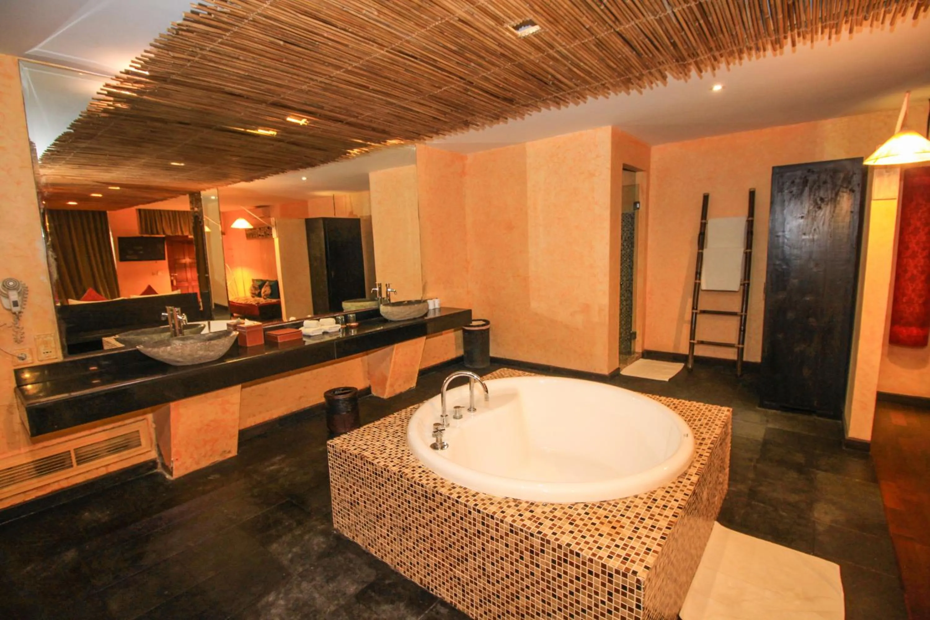 Bath in Kupu Kupu Jimbaran Beach Hotel & Spa by L’Occitane