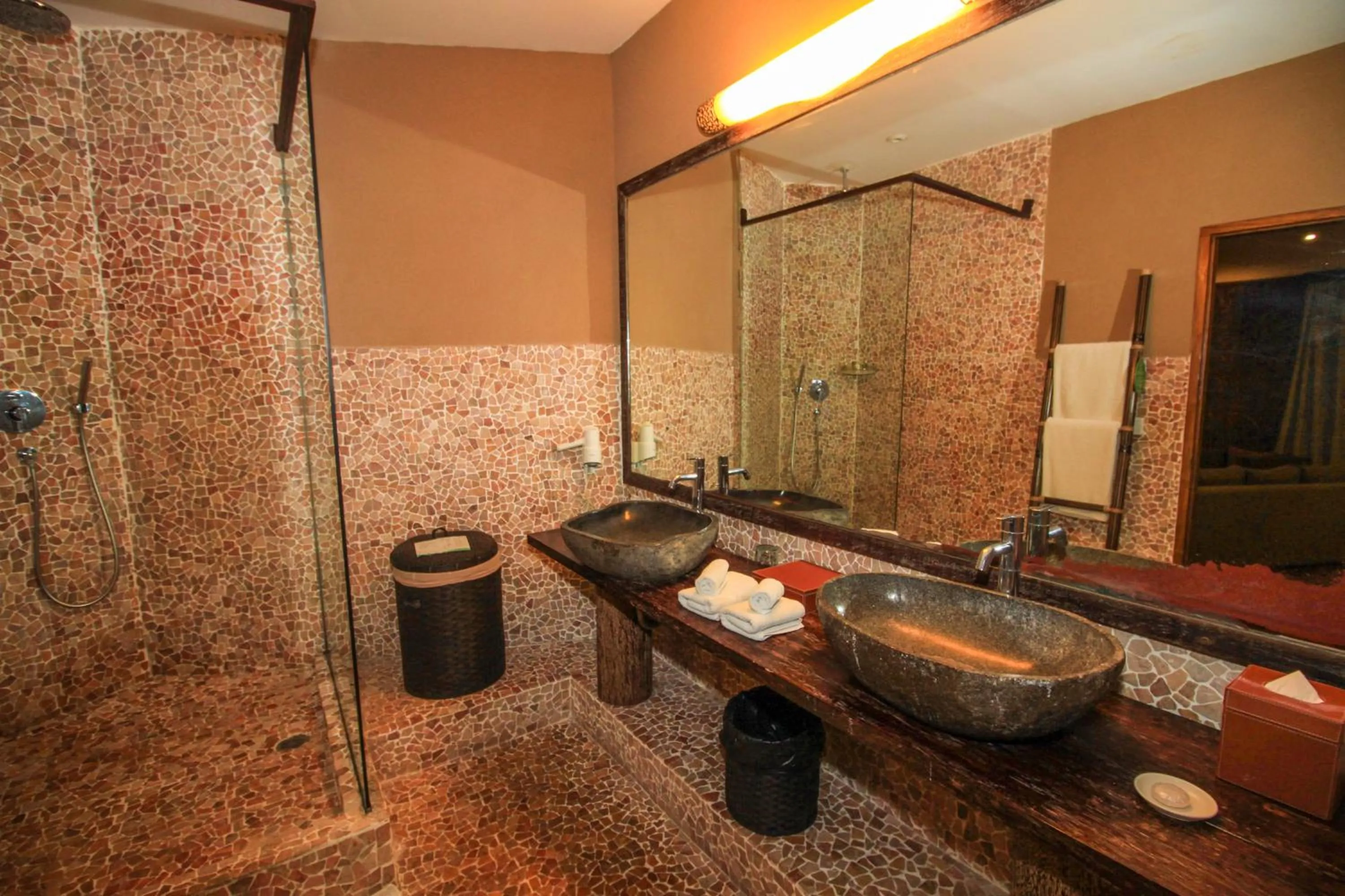 Bathroom in Kupu Kupu Jimbaran Beach Hotel & Spa by L’Occitane