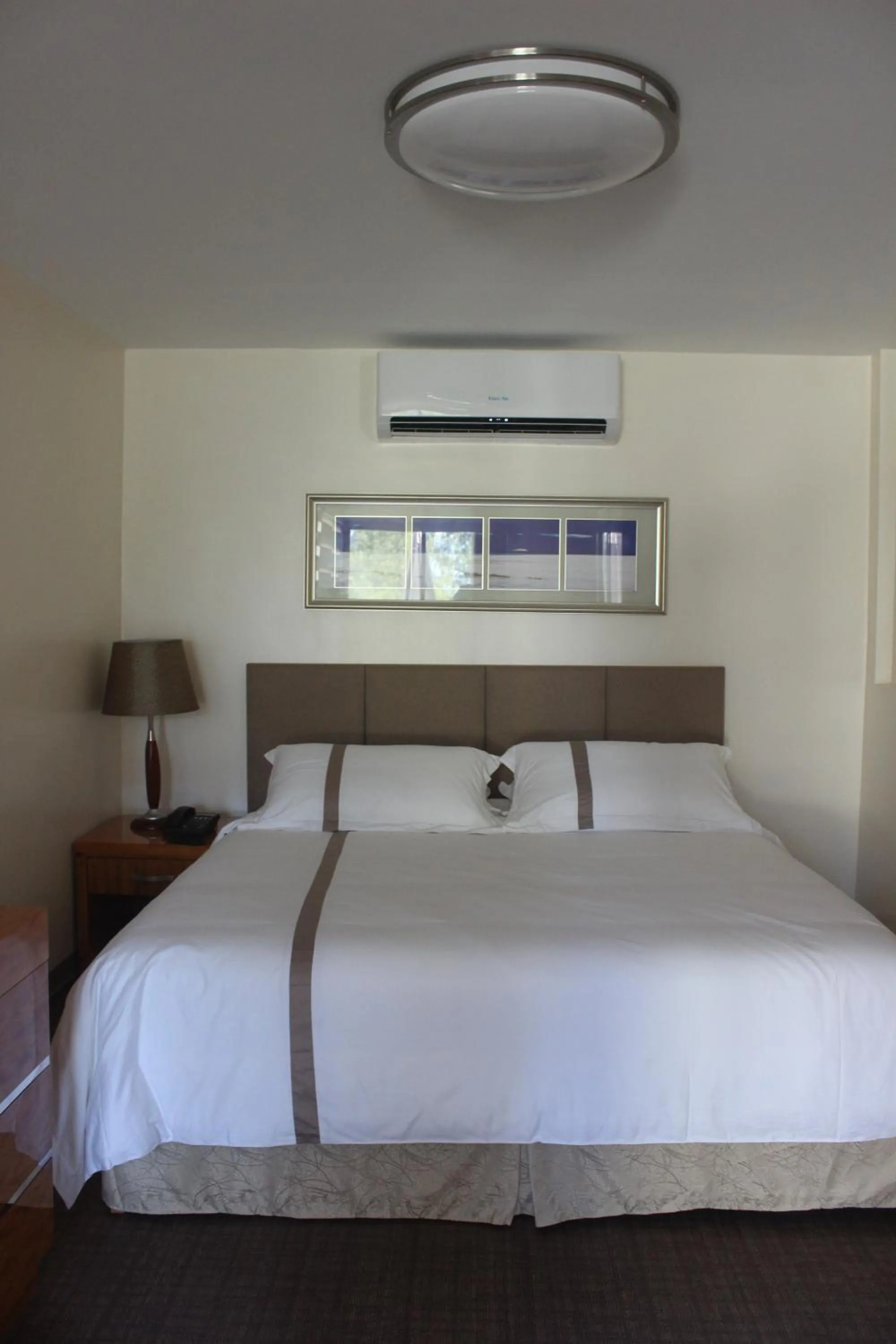 Bed in Saipan Beach Hotel