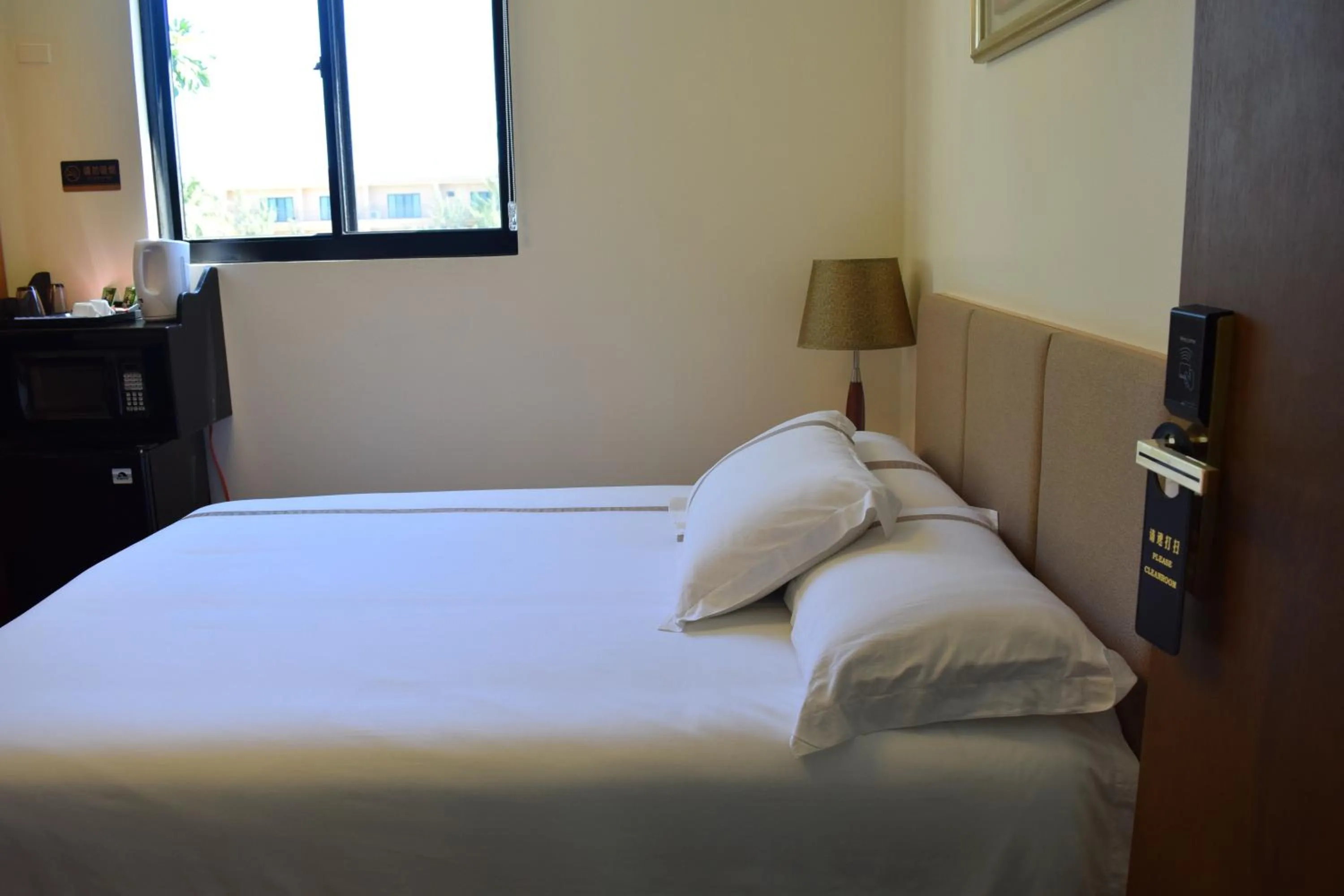 Bed in Saipan Beach Hotel