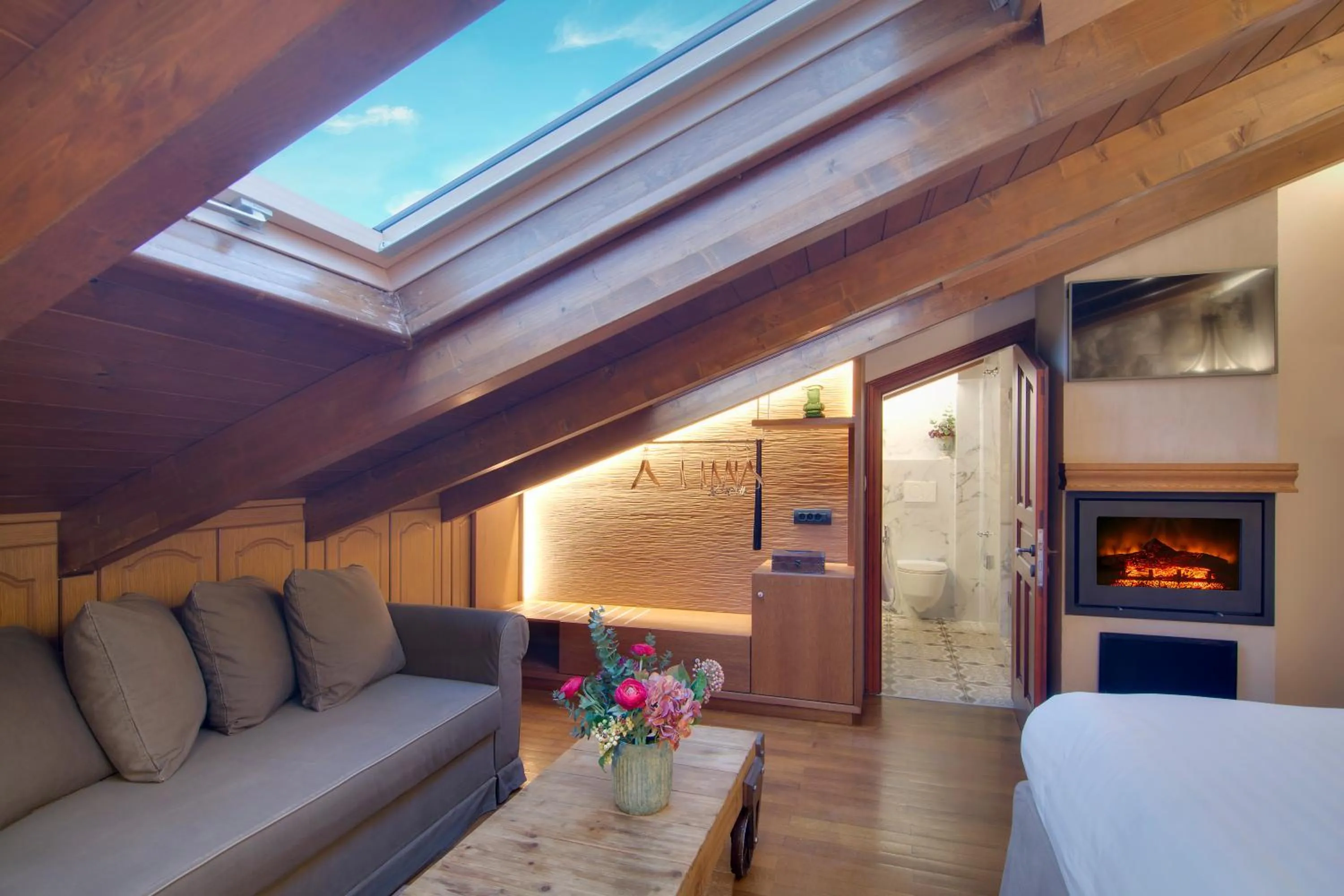 Living room, Bed in ARCHONTARIKI Historic Boutique Hotel