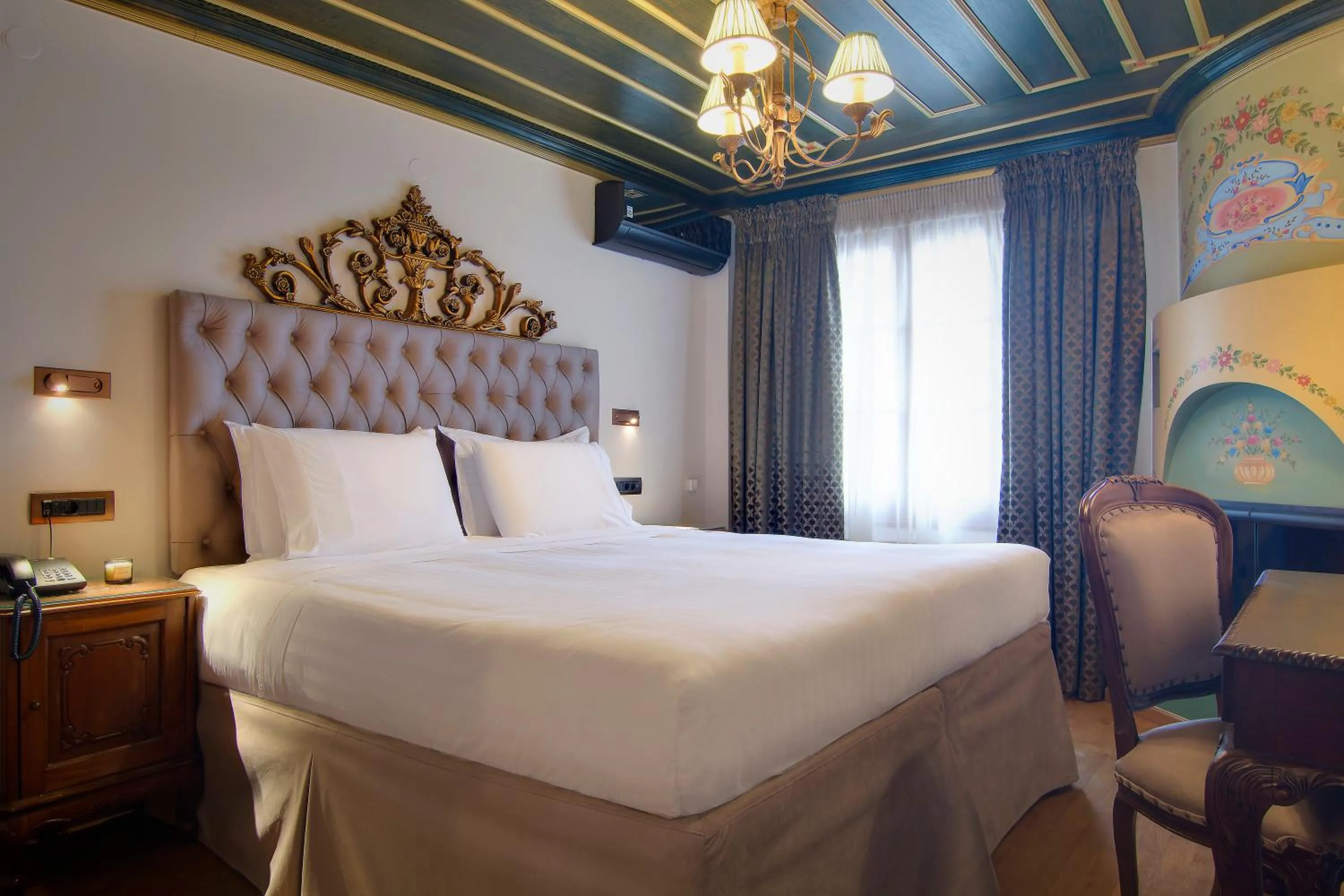 Bed in ARCHONTARIKI Historic Boutique Hotel