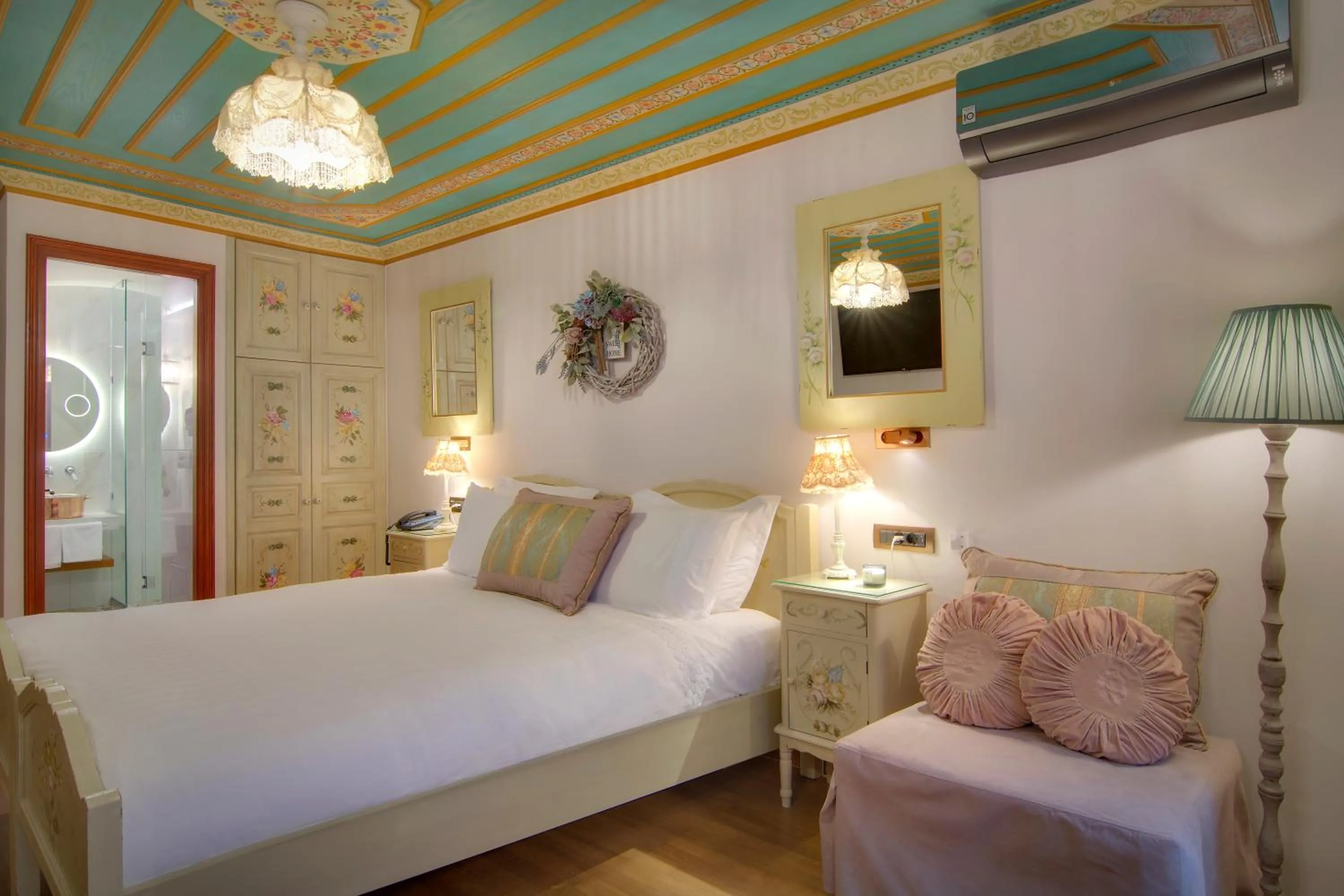 Bed in ARCHONTARIKI Historic Boutique Hotel
