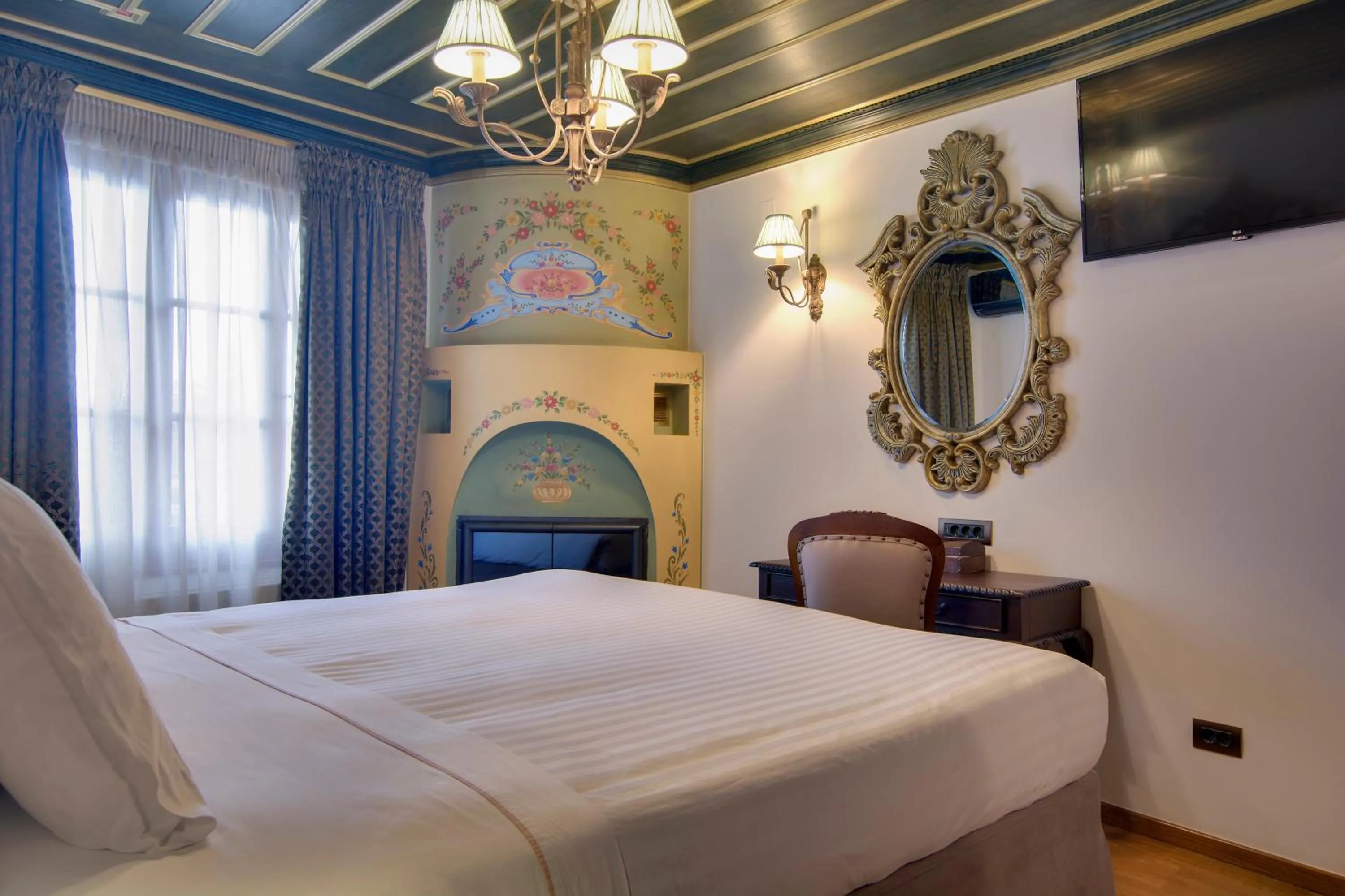Bed in ARCHONTARIKI Historic Boutique Hotel