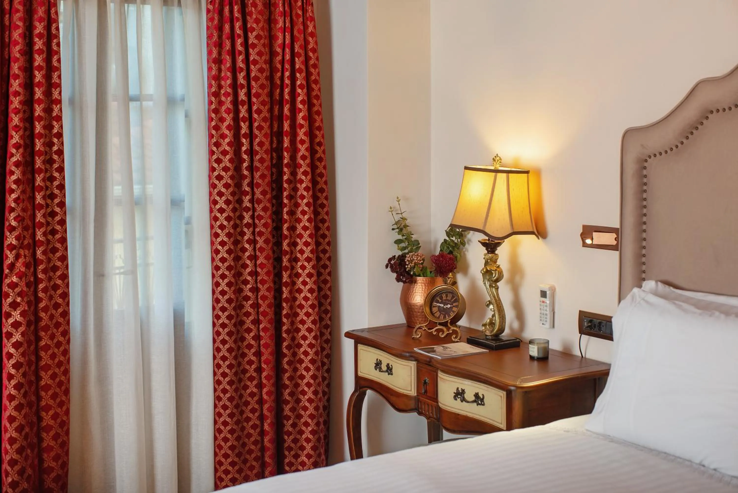 Decorative detail, Bed in ARCHONTARIKI Historic Boutique Hotel