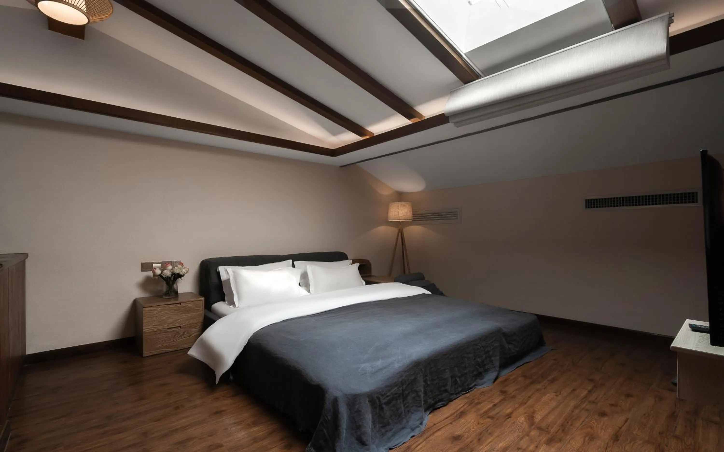 Bed in Lijiang Gemmer Hotel