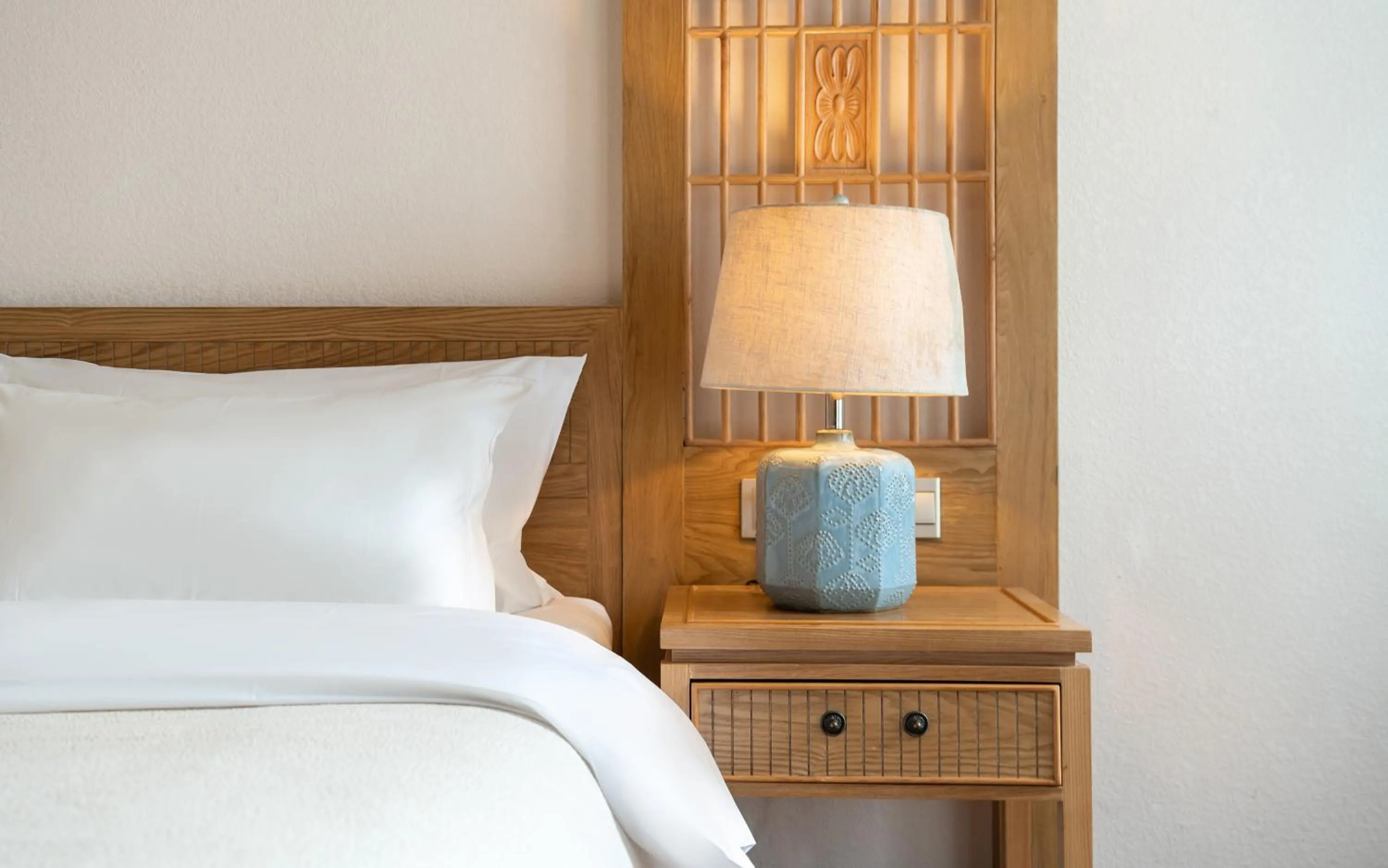 Bed in Lijiang Gemmer Hotel