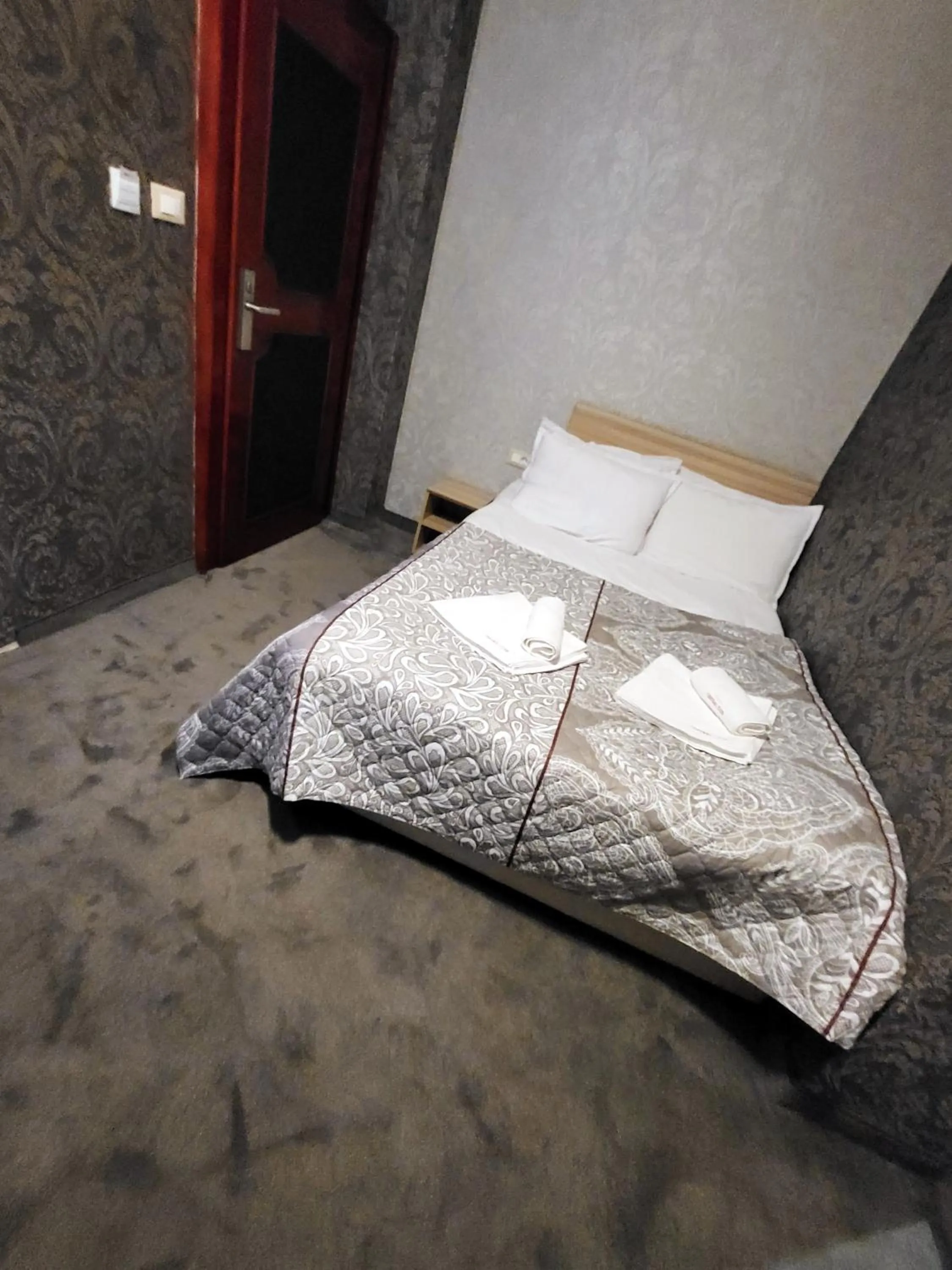 Bed in Gloria Palace Hotel