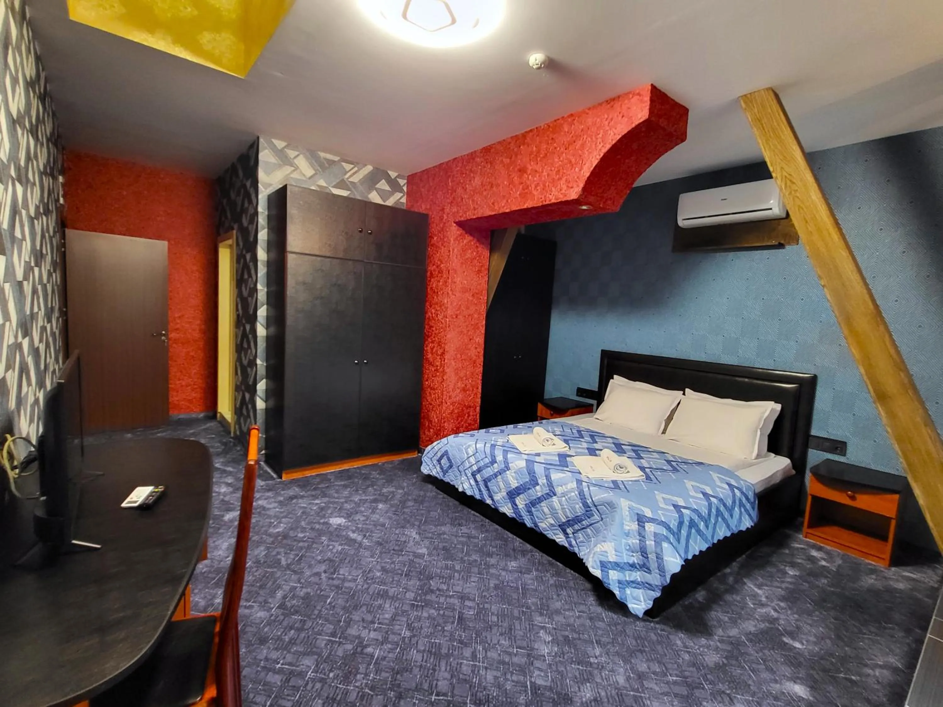 Bed in Gloria Palace Hotel