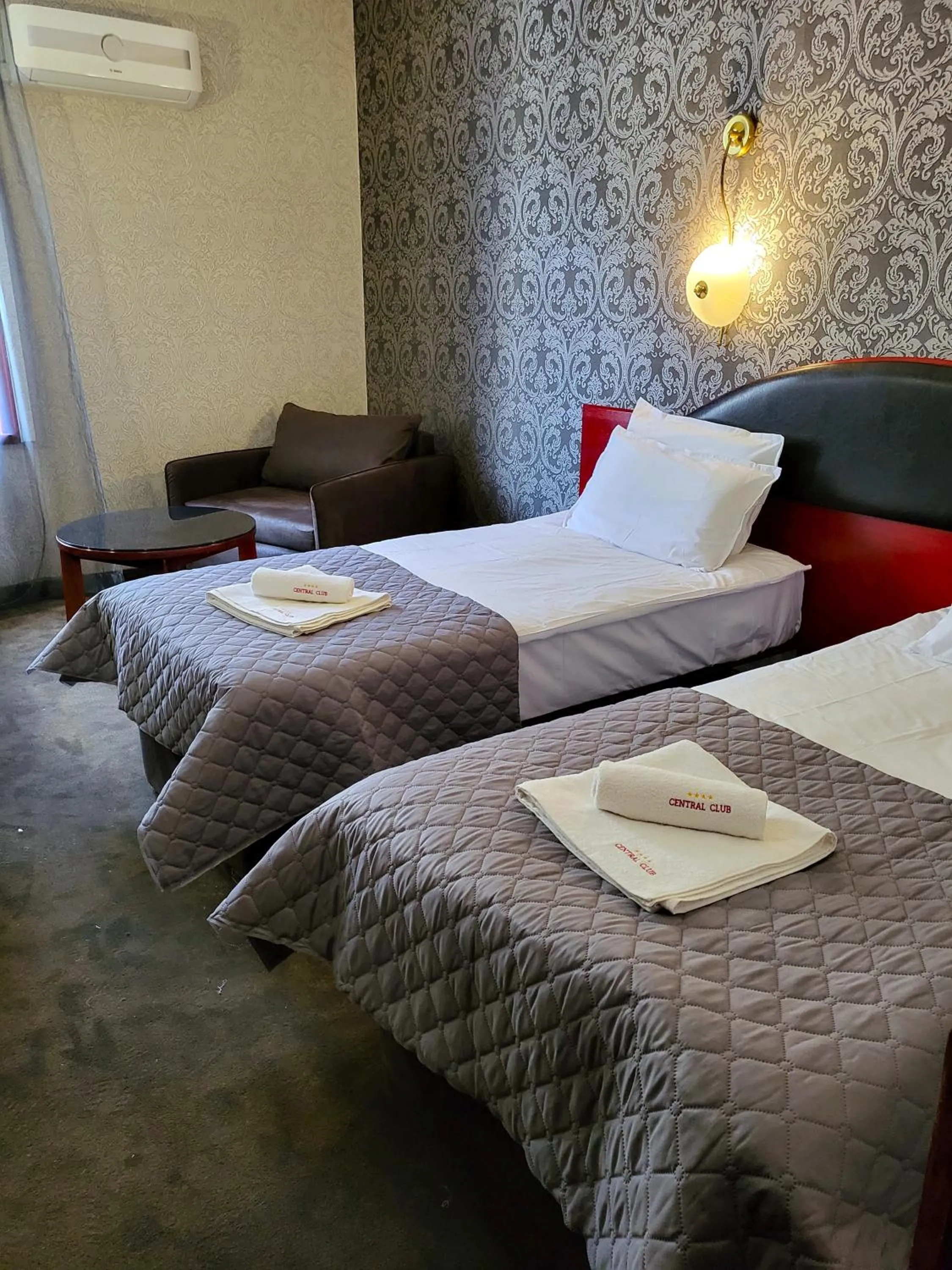 Bed in Gloria Palace Hotel