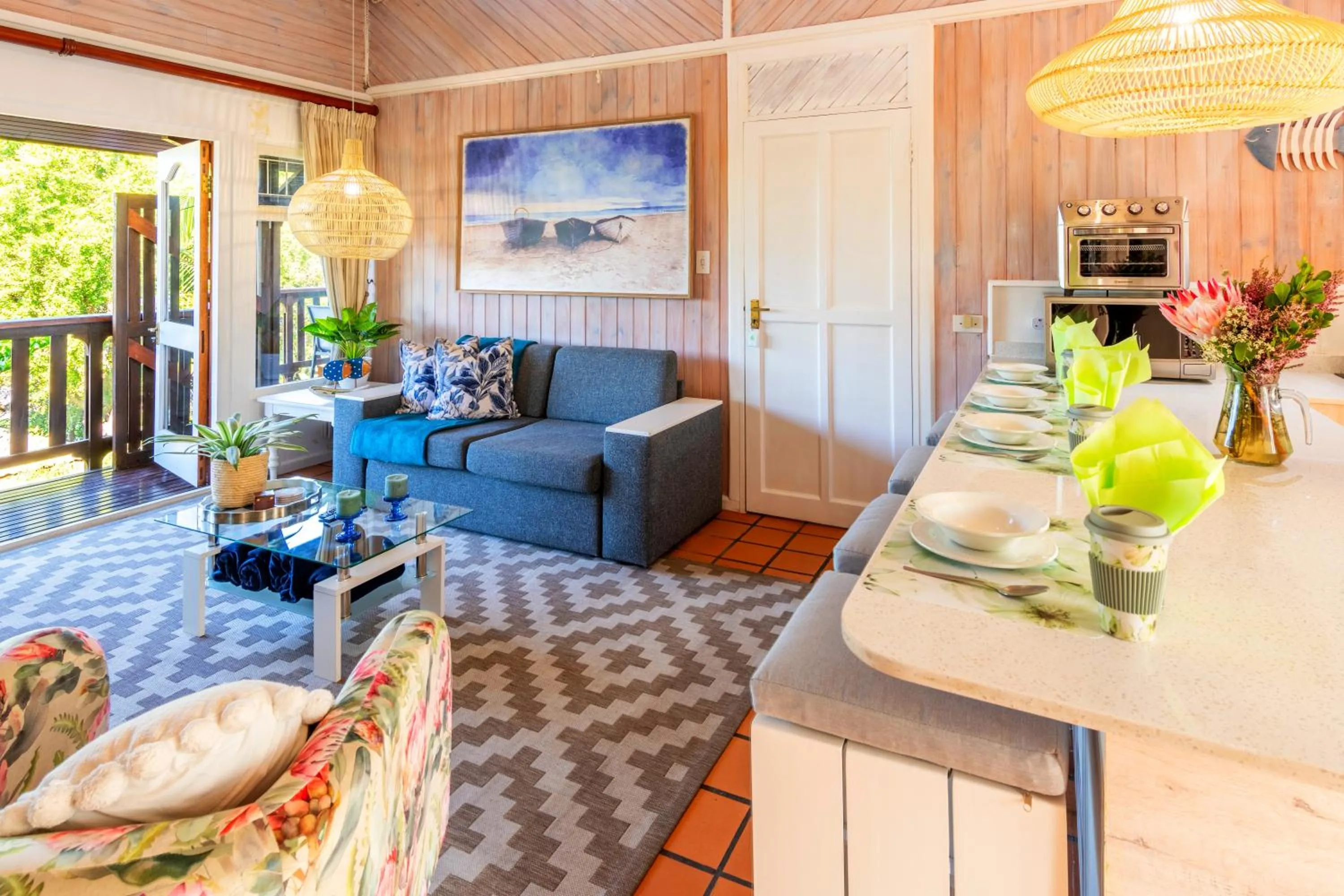 Communal lounge/ TV room in Knysna River Club by First Private Stays