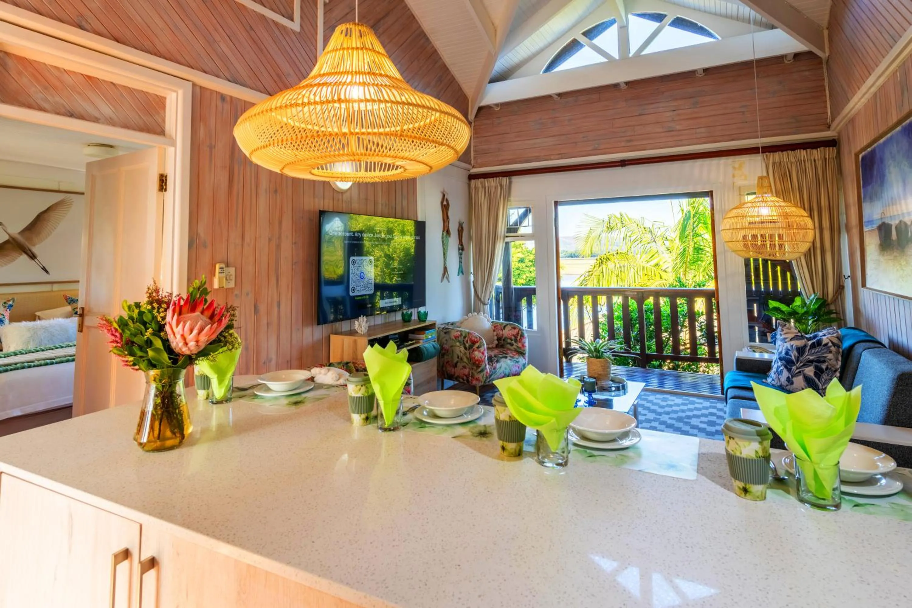 Communal lounge/ TV room in Knysna River Club by First Private Stays