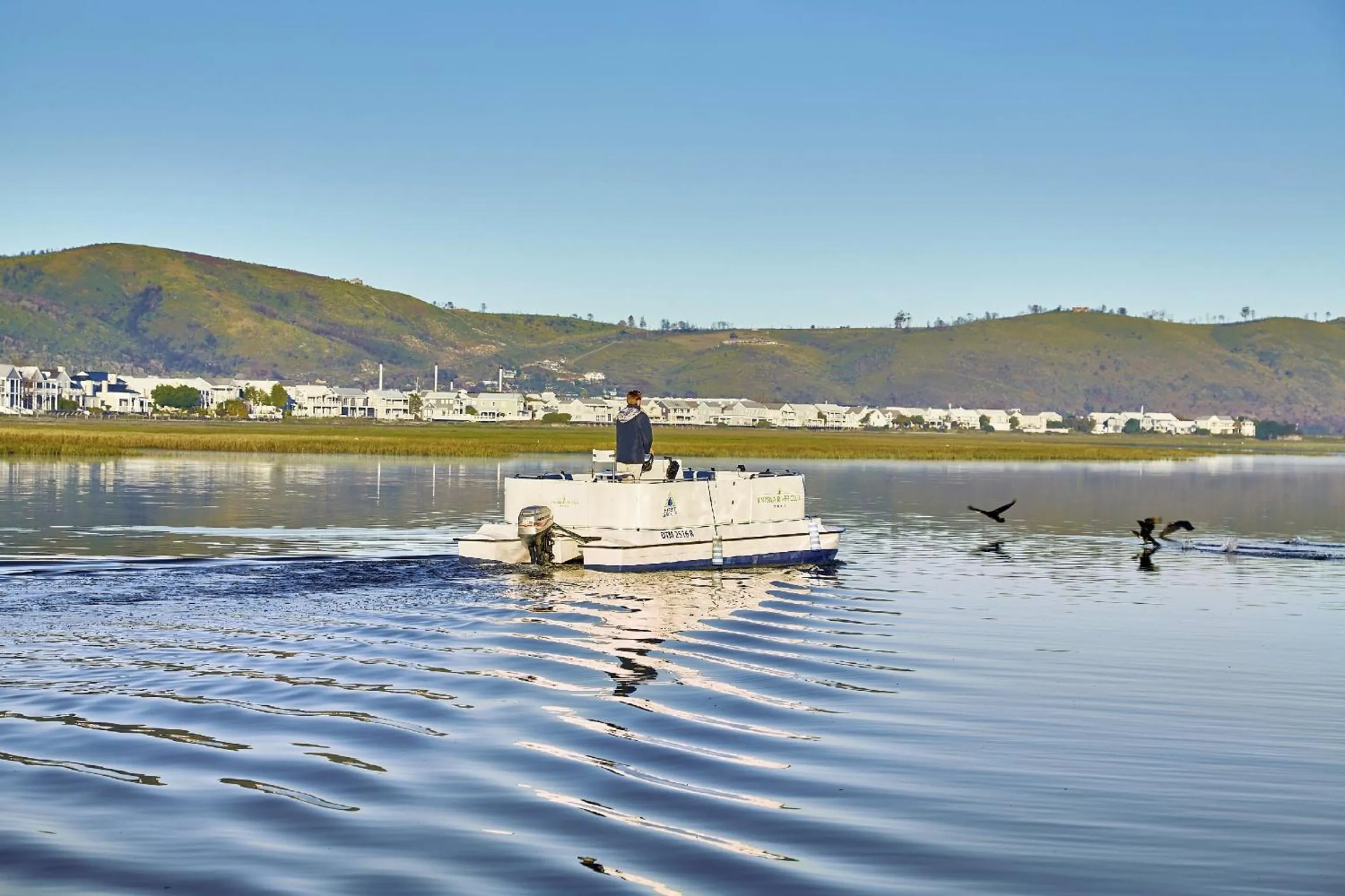 Fishing in Knysna River Club by First Private Stays