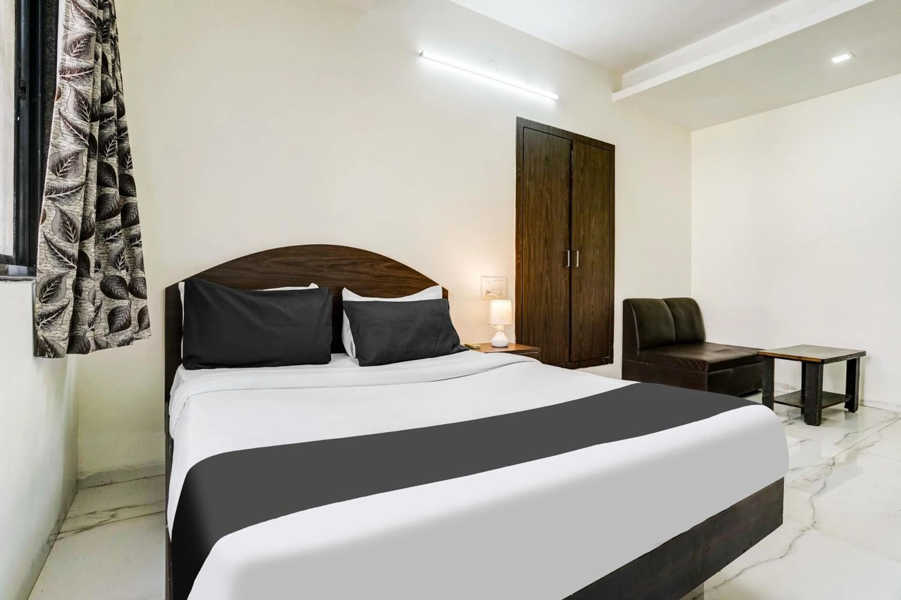 Bedroom, Bed in FabHotel Sahara Inn - Nr Vijay Mamta Theatre, Nashik Road