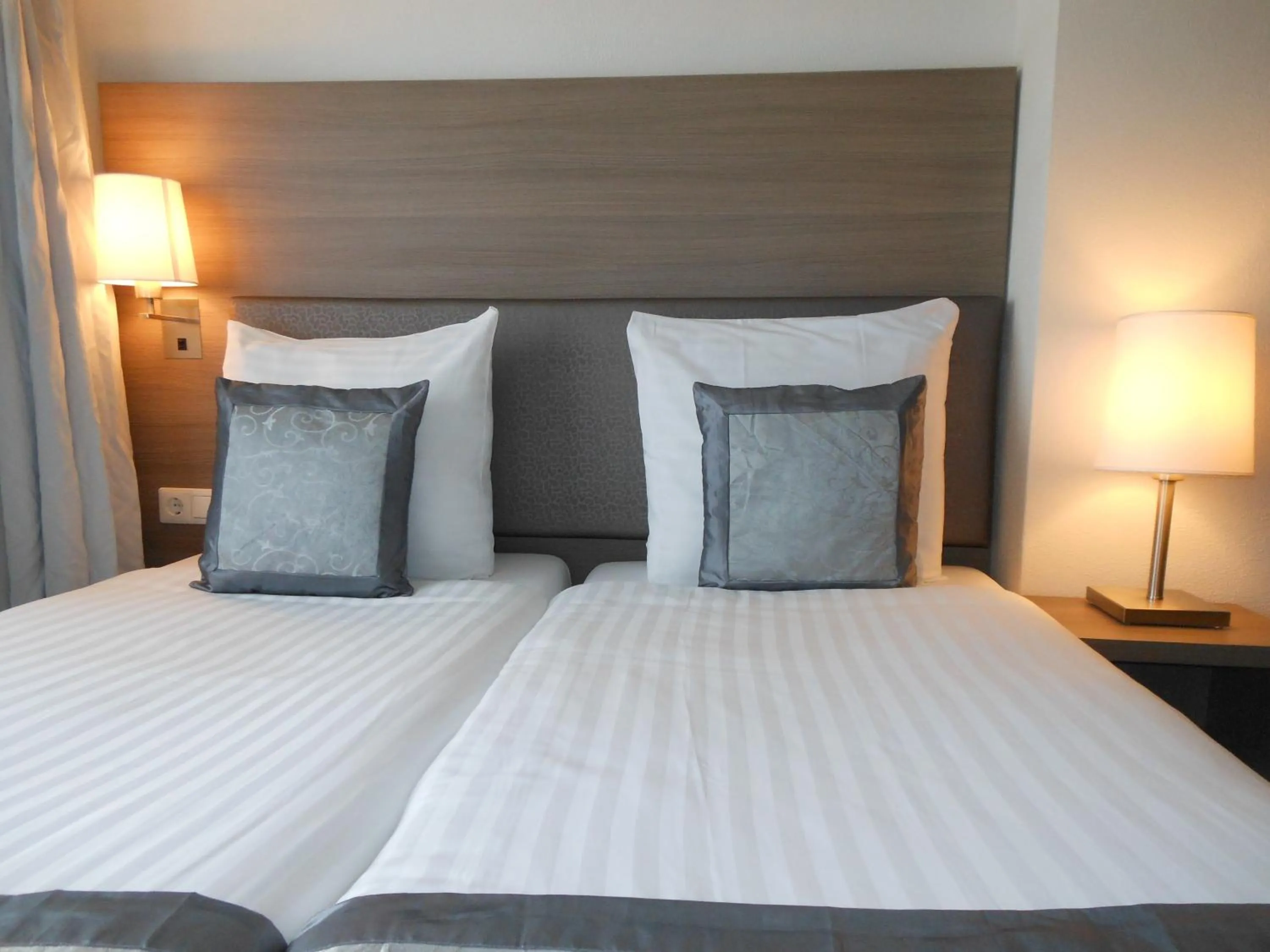 Bed in The Concert Hotel