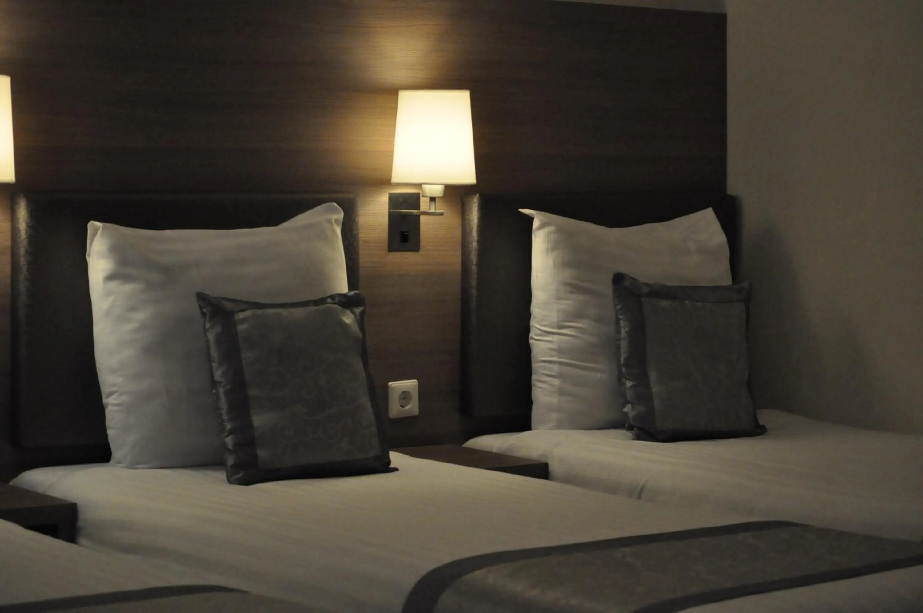 Bed in The Concert Hotel