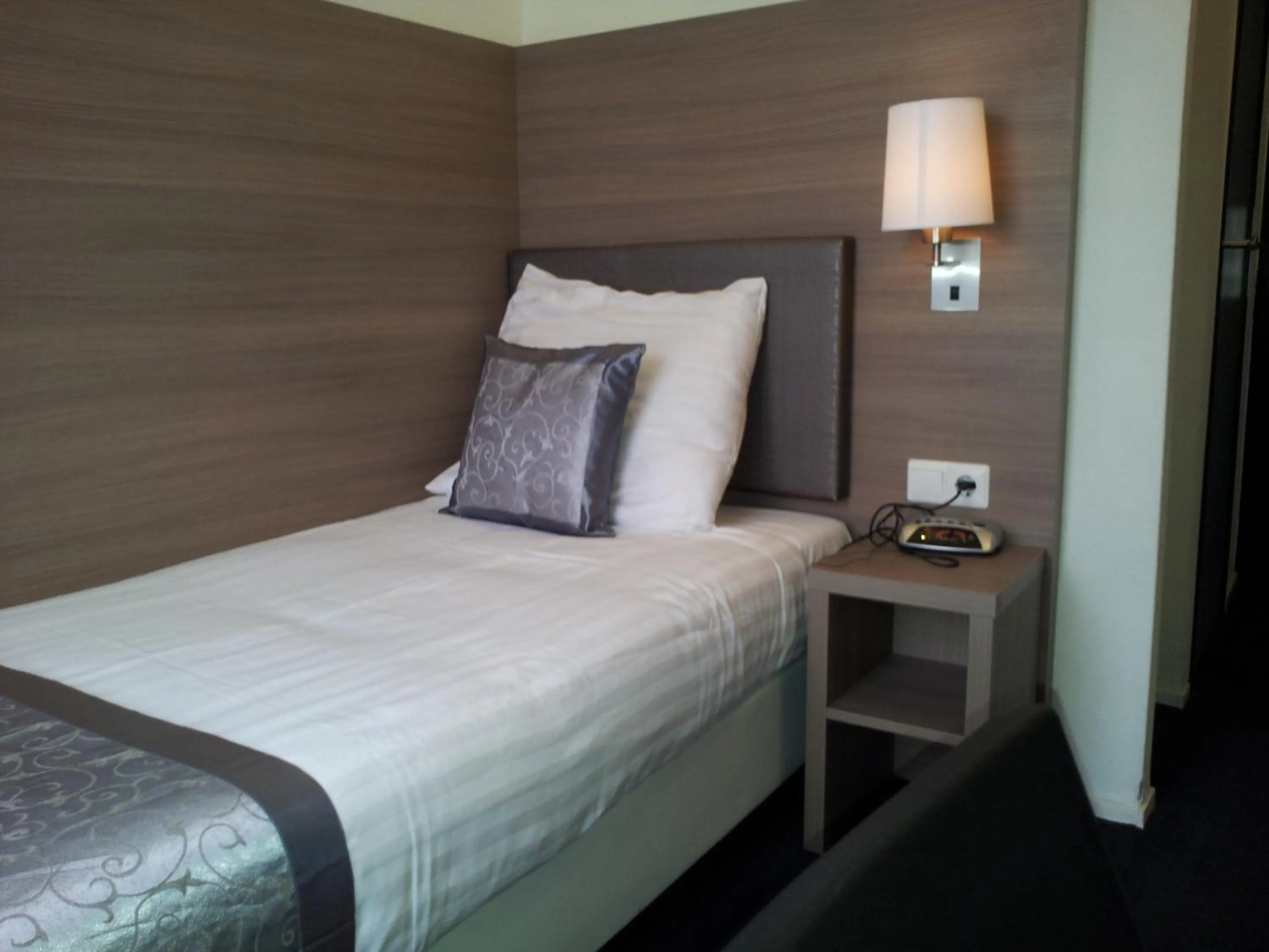 Bed in The Concert Hotel