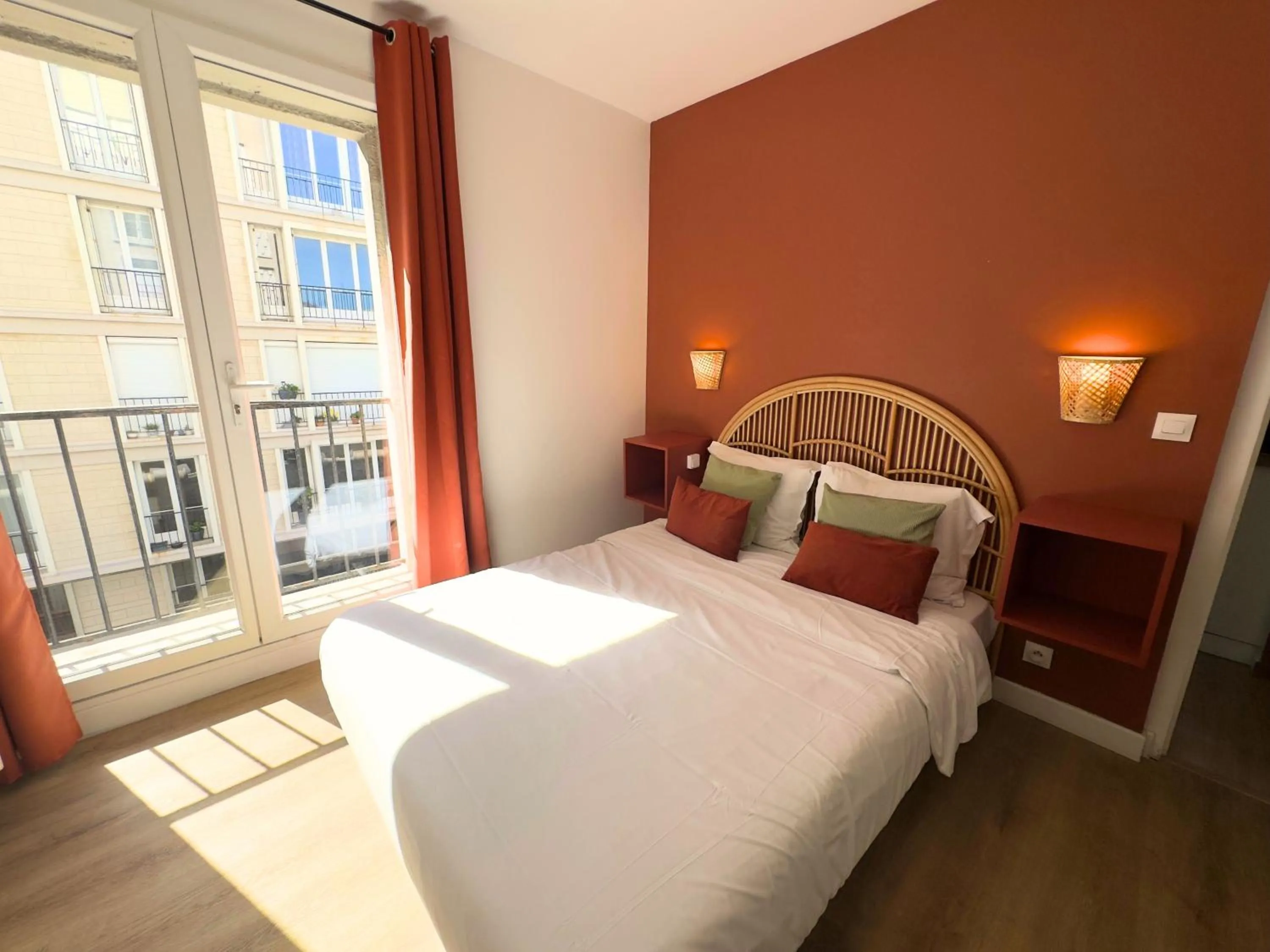 Bed in L'Escale Appartements et Suites en bord de Mer