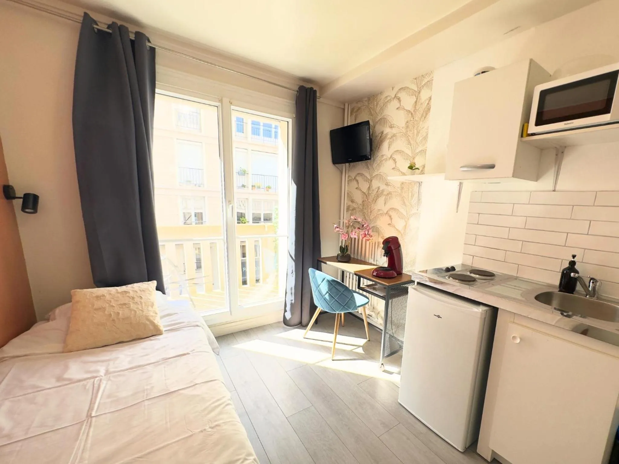 Bed in L'Escale Appartements et Suites en bord de Mer