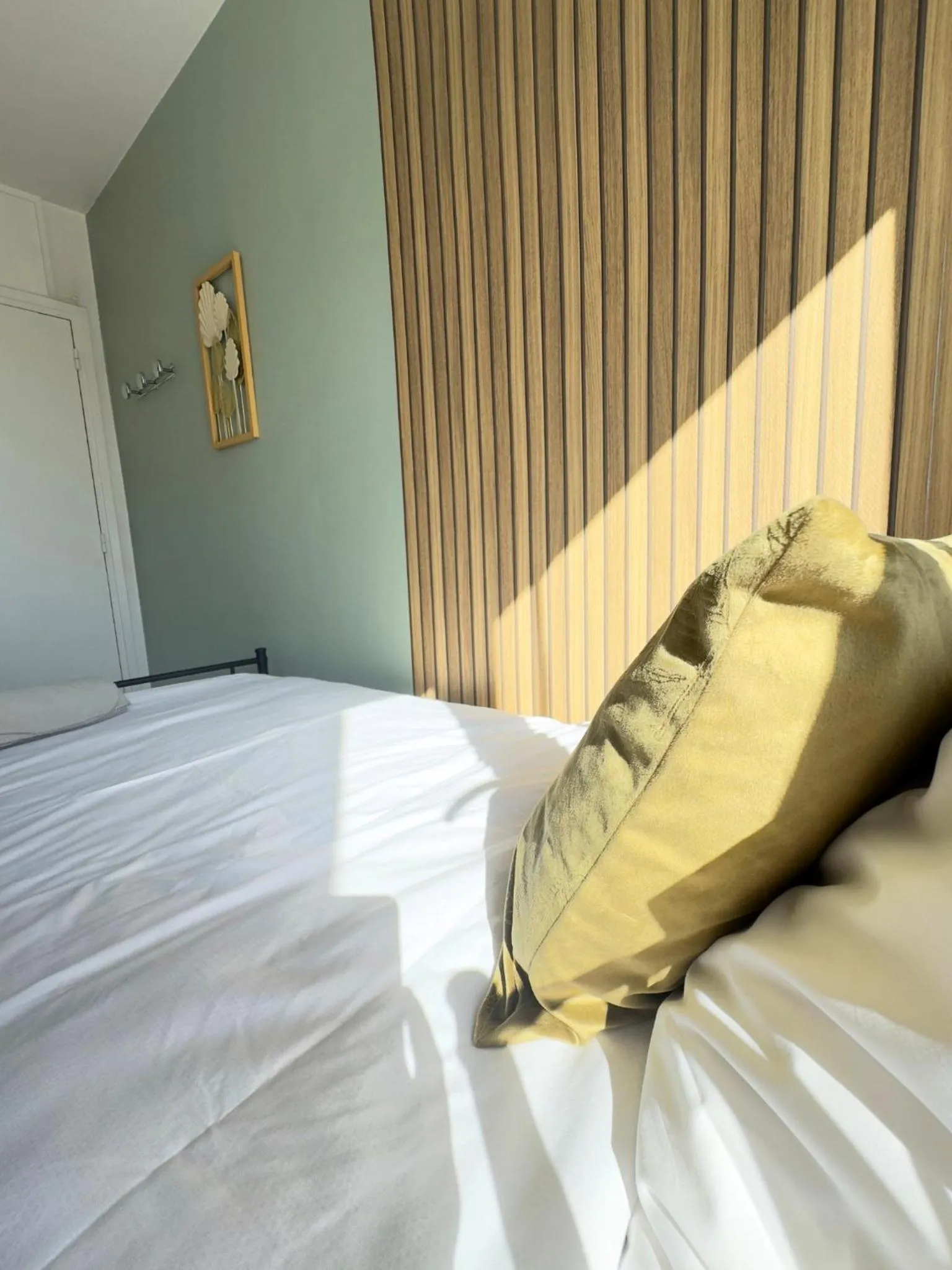 Bed in L'Escale Appartements et Suites en bord de Mer