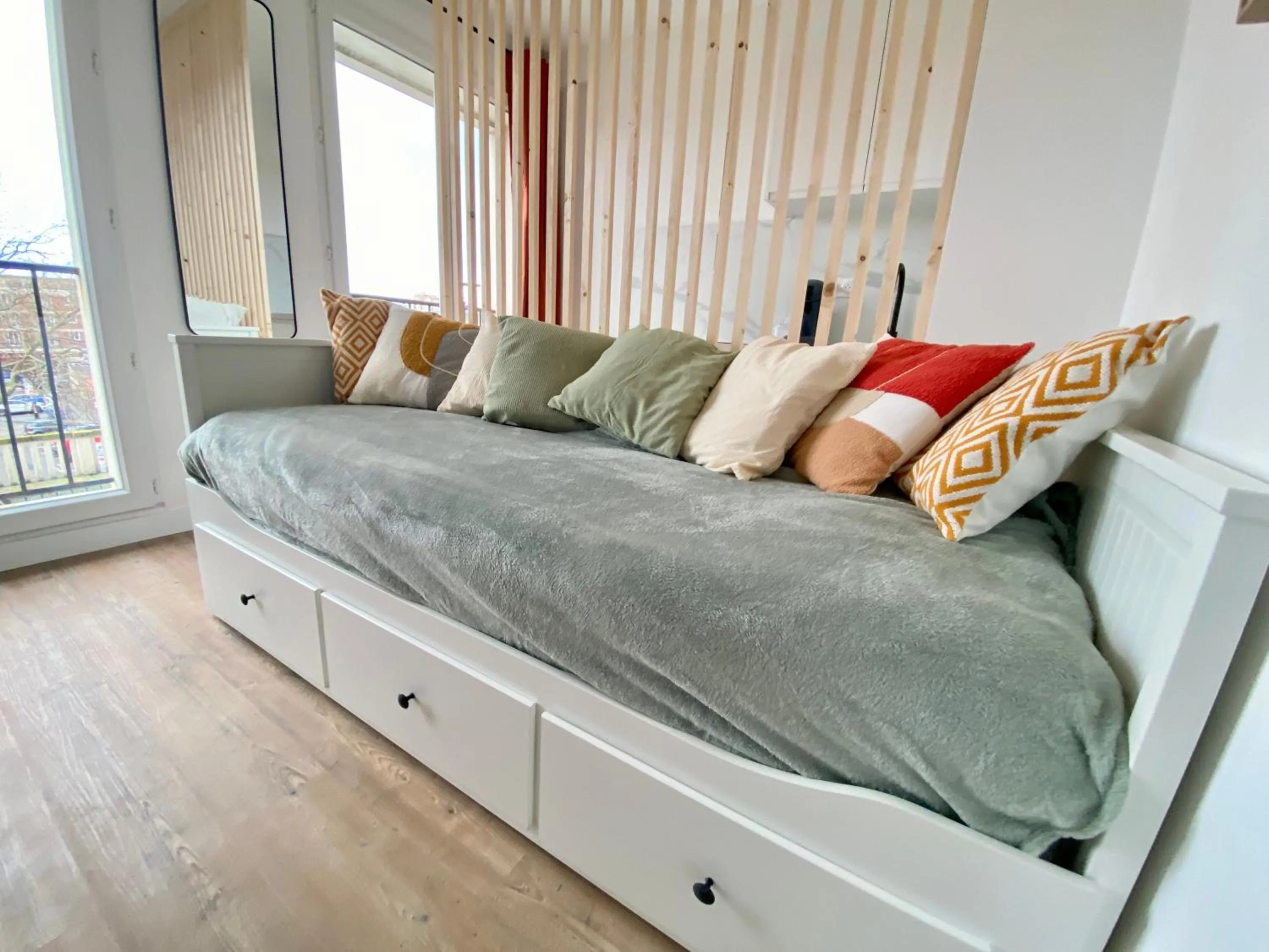 Bed in L'Escale Appartements et Suites en bord de Mer