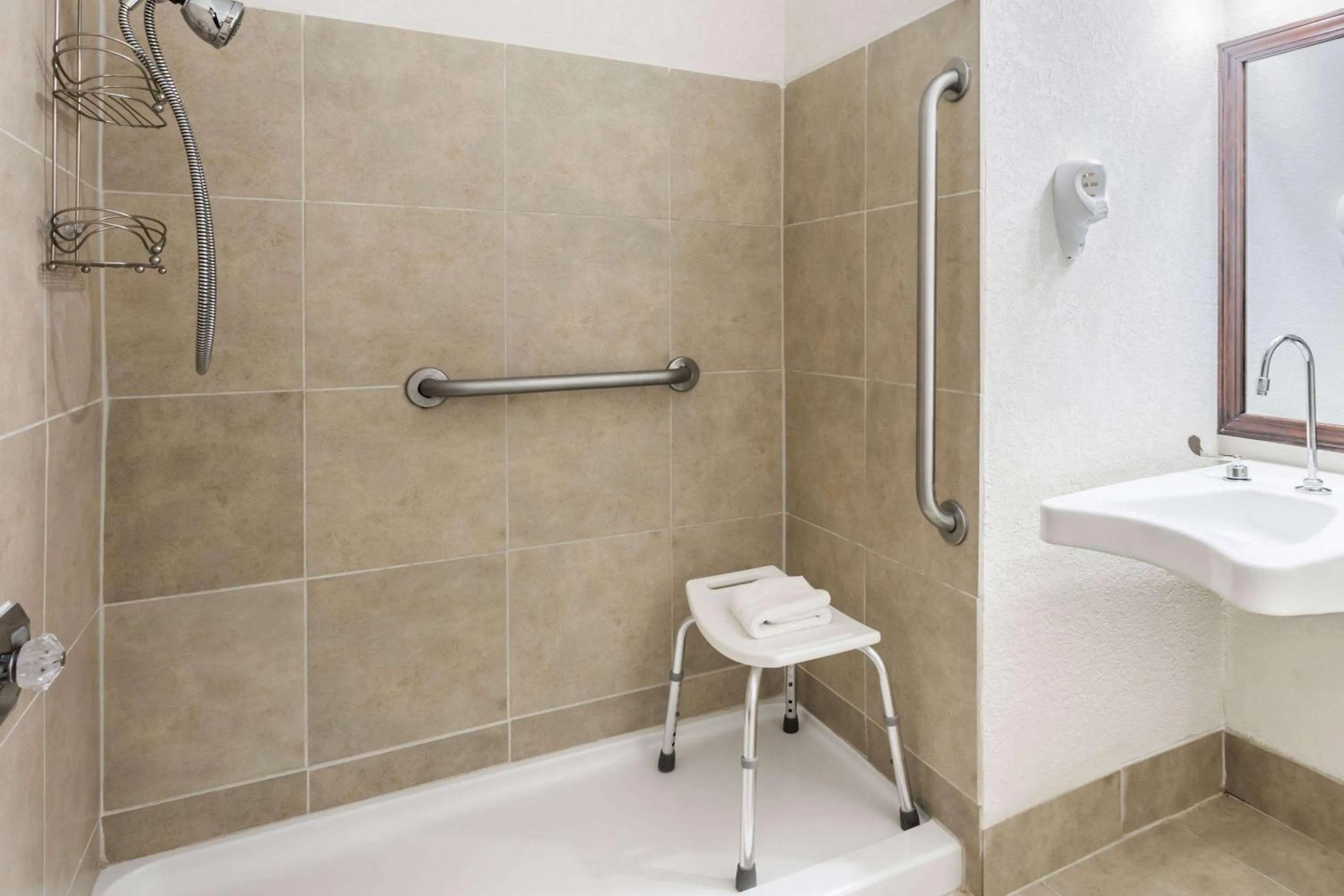 Shower in Baymont by Wyndham Greensboro/Coliseum