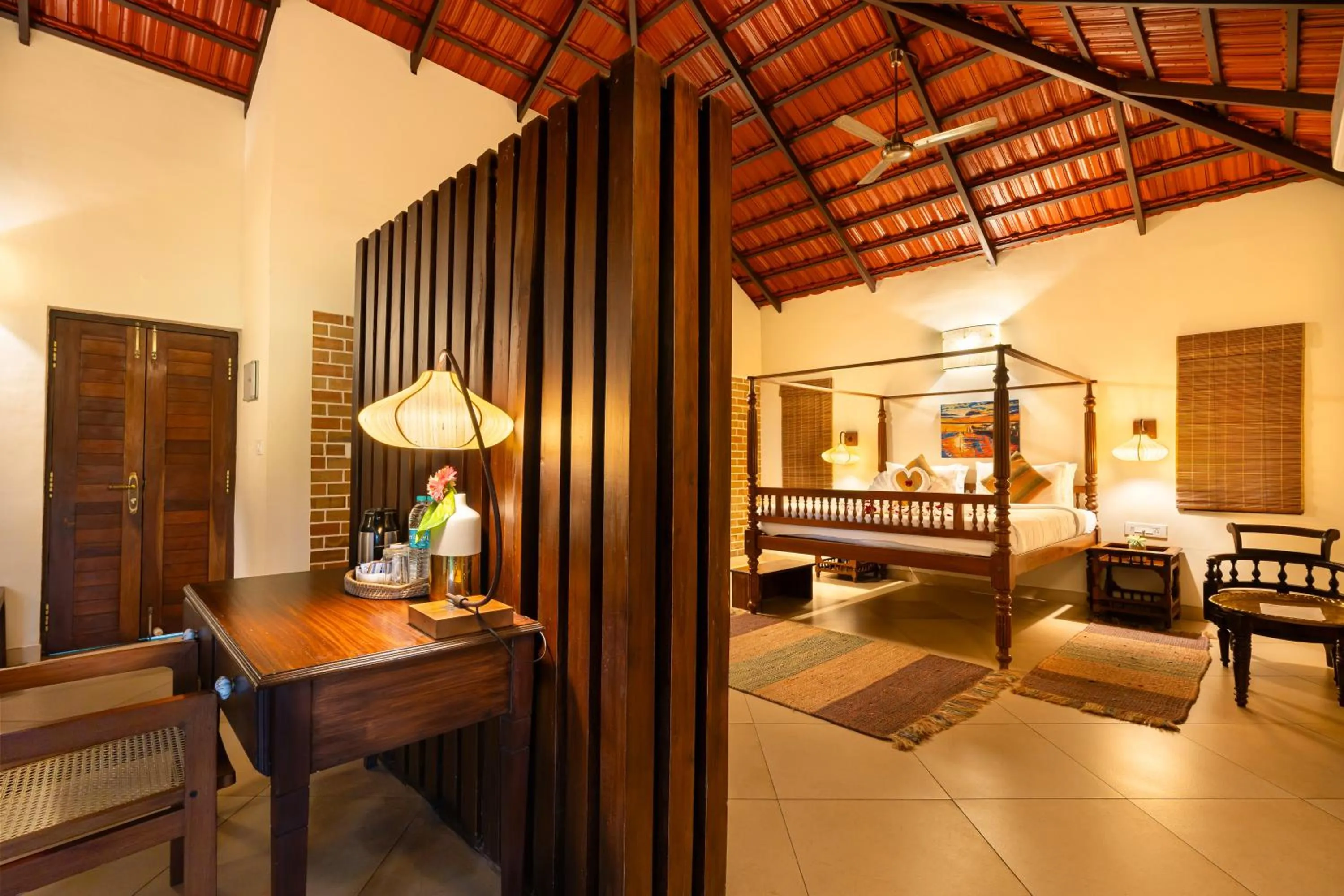 Seating area, Bed in Raindrops Resorts Wayanad