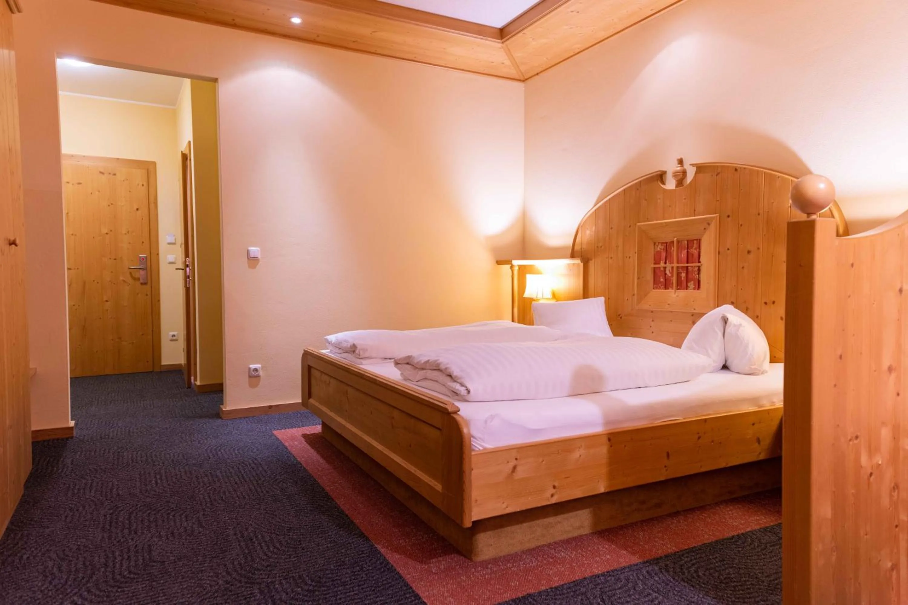 Photo of the whole room, Bed in Alpin Panoramahotel Lärchenhof