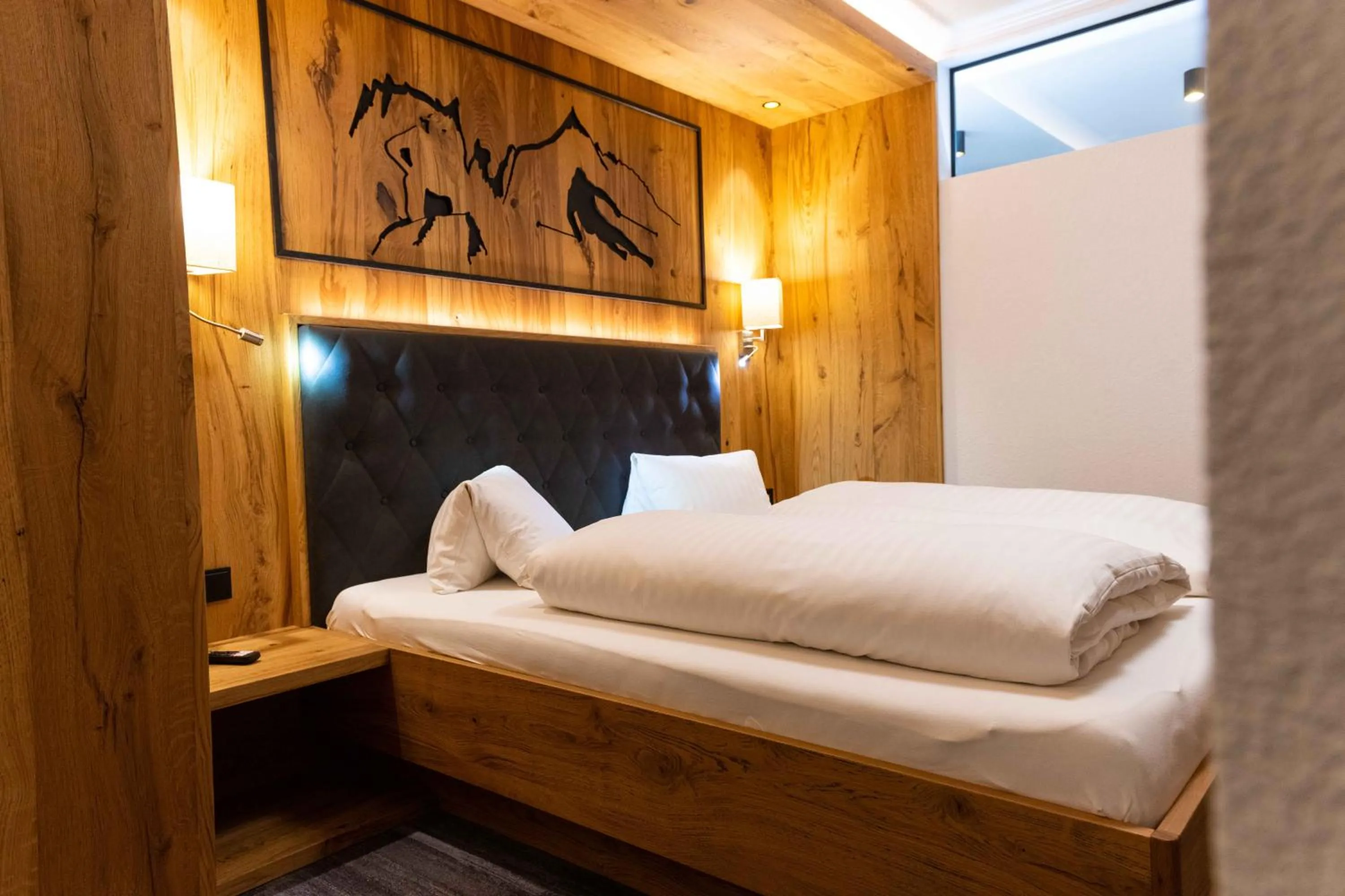 Photo of the whole room, Bed in Alpin Panoramahotel Lärchenhof